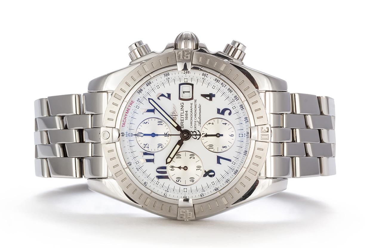 We are pleased to offer this Breitling Stainless Steel Chronomat Evolution A13356. This watch features a 44mm stainless steel case, white chronograph dial with silver markers, white inner bezel and silver sub dials, stainless steel Breitling pilots