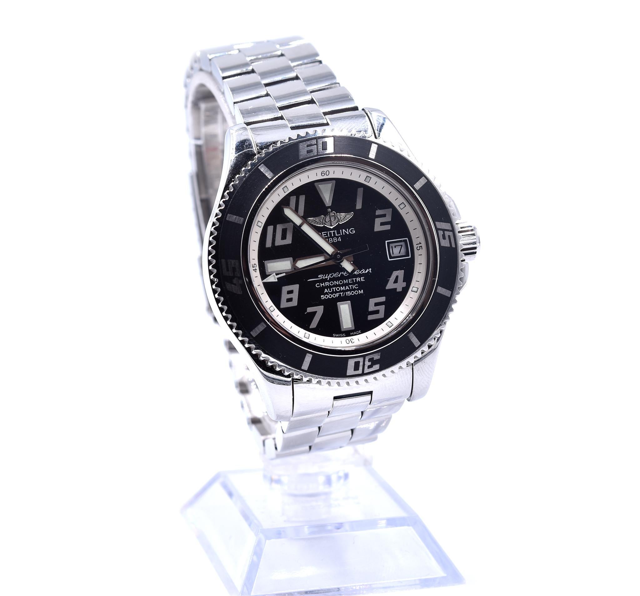 Movement: automatic
Function: hours, minutes, seconds, date indicator, 
Case: 42mm stainless steel case, sapphire protective crystal, screw down crown, uni-directional rotating bezel
Band: stainless steel bracelet with folding clasp, will fit 7 ½