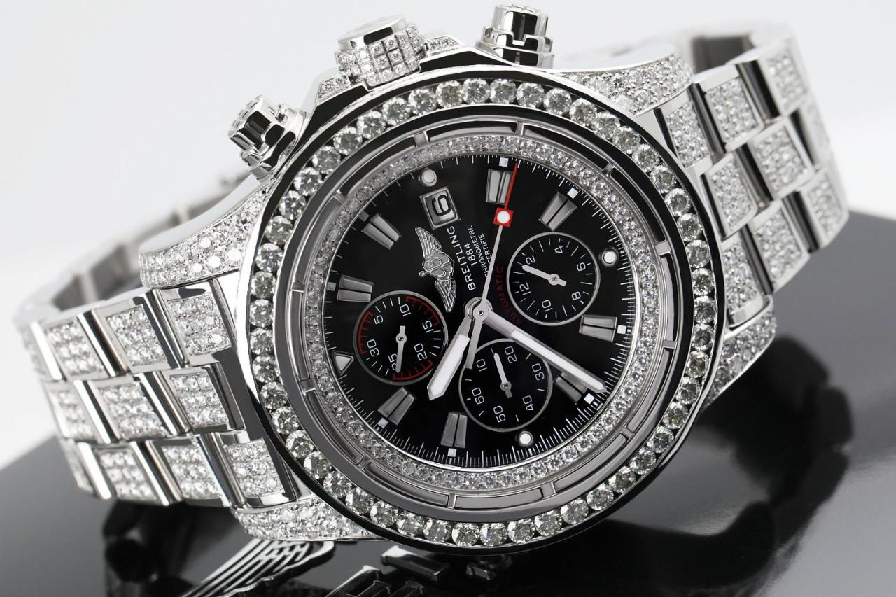Prestige Breitling Super Avenger A13370 stainless steel watch. Diamond bracelet, case, and bezel, total of 15ct. Black dial with silver sticks, chronograph, date, and water resistance of over 100m.