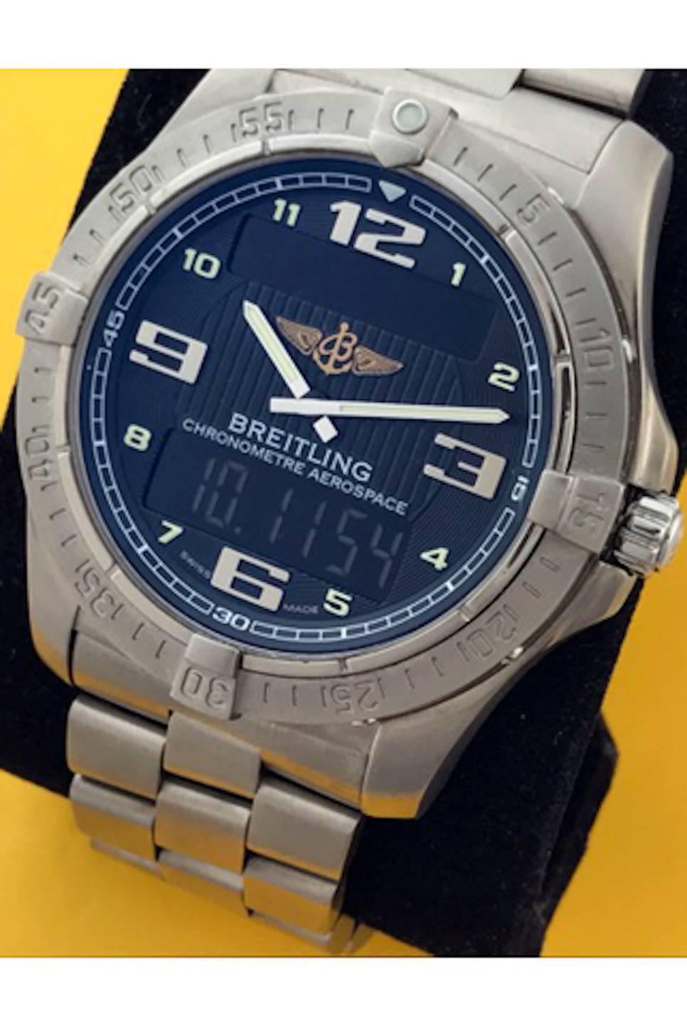 Breitling Aerospace Avantage Titanium Quartz Men's Wrist Watch. Model E7936210/B962-TI. Certified pre-owned and ready to ship! Chronograph- GMT 2nd Time Zone & Alarm Feature - Perpetual Day & Date Calendar - Electronic & Analog LCD Digital Display.
