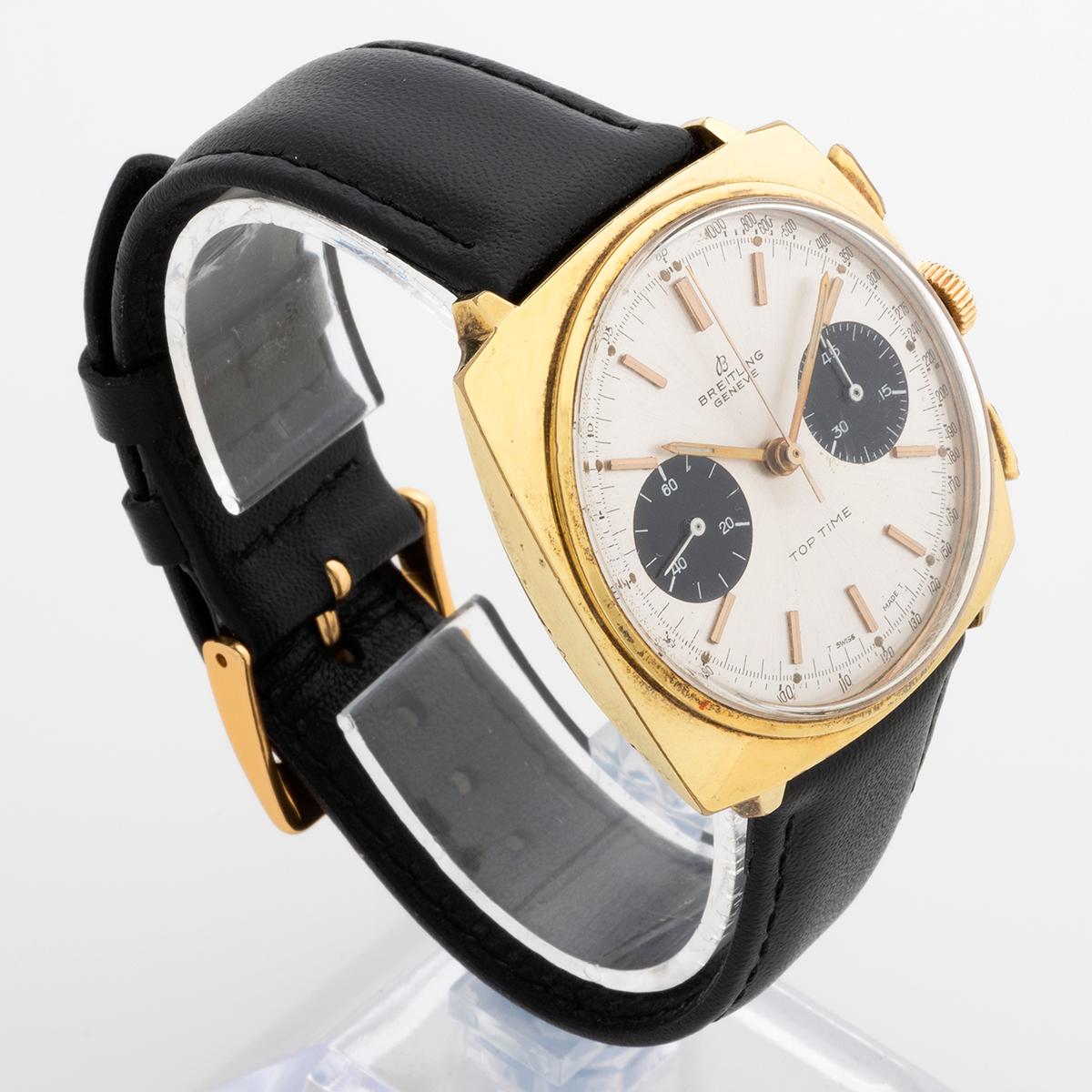 Our vintage Breitling Top Time, reference 2008 ,features a 36.5 x 36.5 square case in gold plated steel, with a silver dial and sub dials in black. Fitted to a generic quality black leather strap and gold tone tang buckle, this Top Time is presented