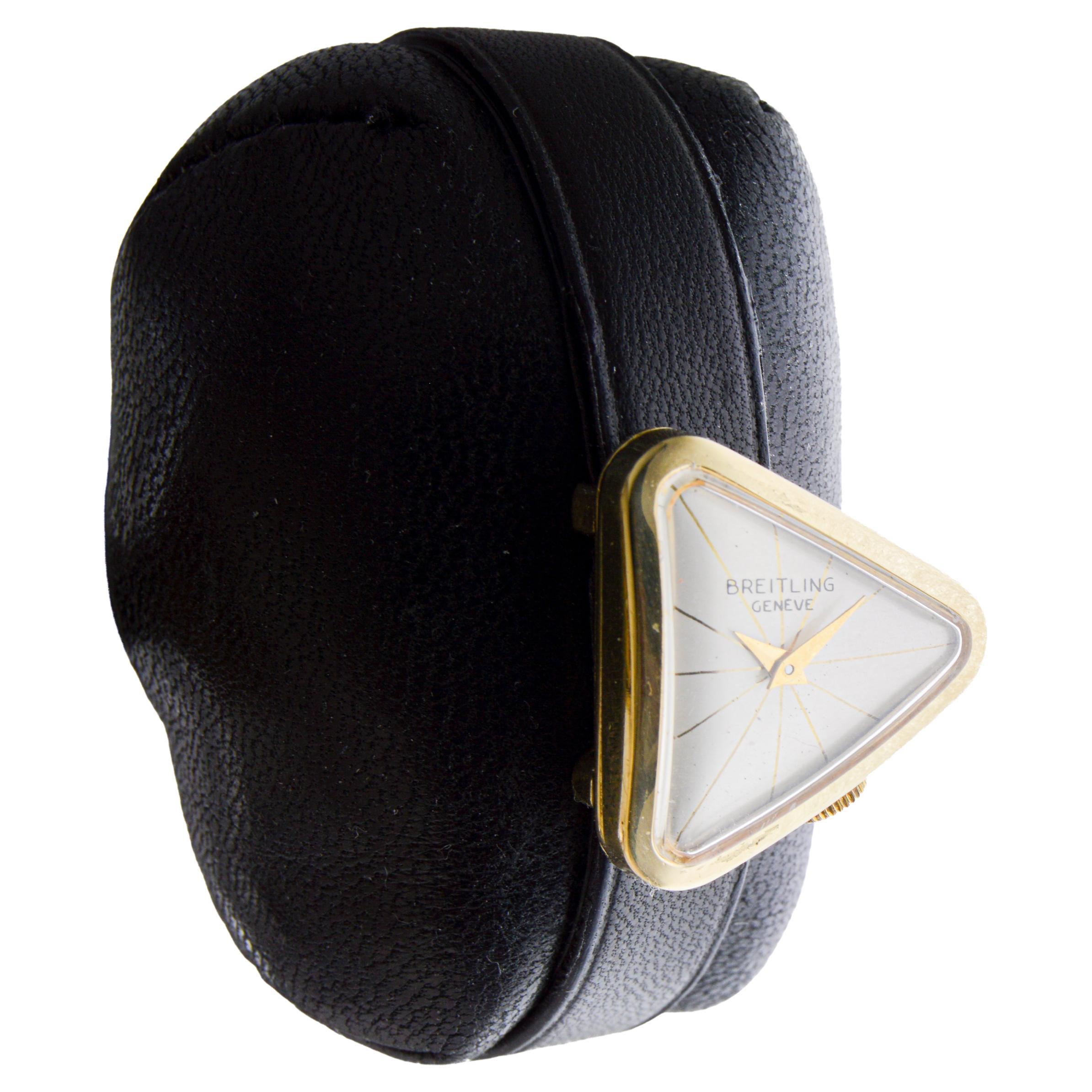 FACTORY / HOUSE: Breitling Watch Company
STYLE / REFERENCE: Asymmetrical 
METAL / MATERIAL: 18Kt Solid Gold
CIRCA / YEAR: 1950's or 60's
DIMENSIONS / SIZE: Length 23mm 