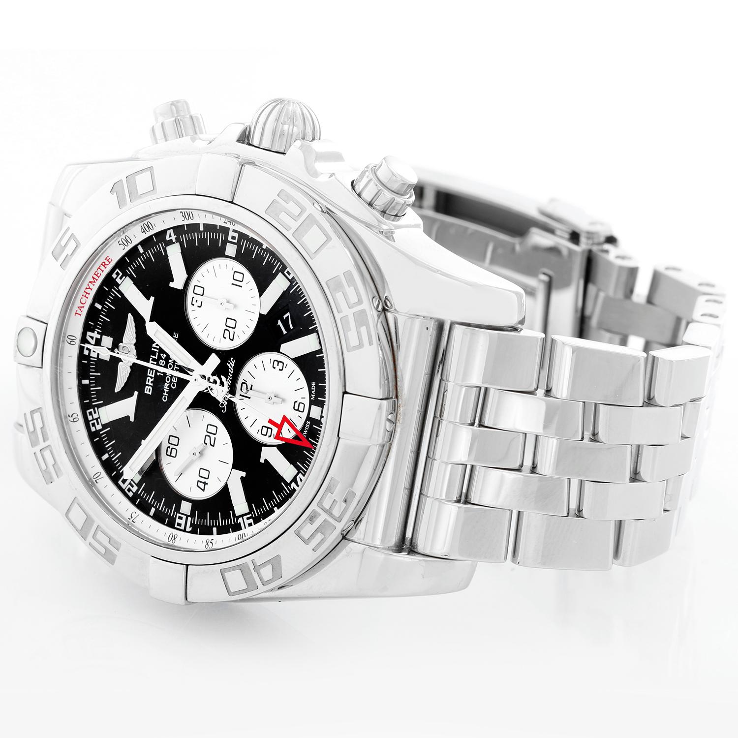 Breitling Windrider Chronomat GMT Men's Steel Watch AB0410 - Automatic winding. Stainless steel case with rotating bezel  (47mm diameter). Black dial with silver sub-dials;  hour, minute & seconds recorders; red arrow GMT hand. Stainless steel