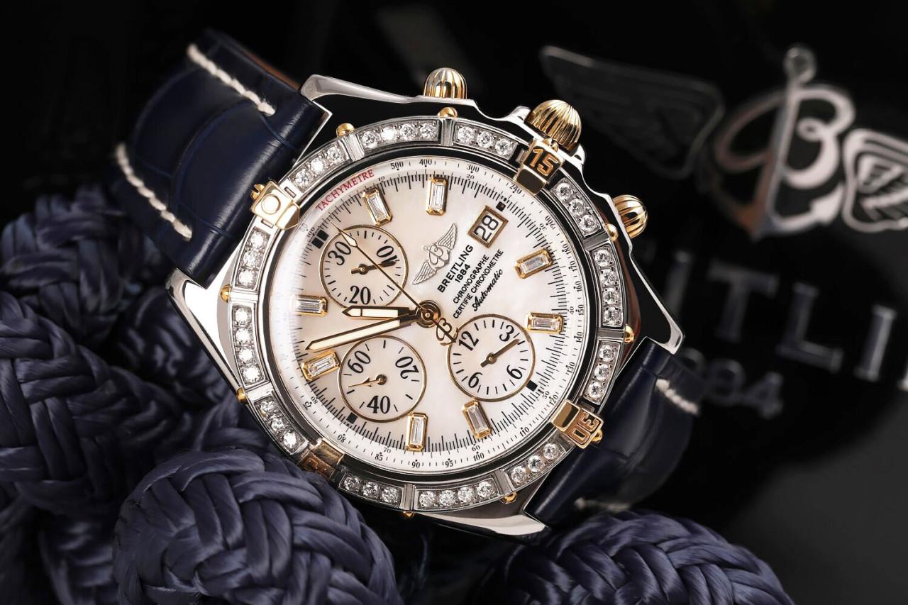 Breitling Windrider Crosswind Chronograph White MOP Diamond Dial Mens Watch with Custom Diamond Bezel B13355 

This watch is in like new condition. It has been polished, serviced and has no visible scratches or blemishes. All our watches come with a