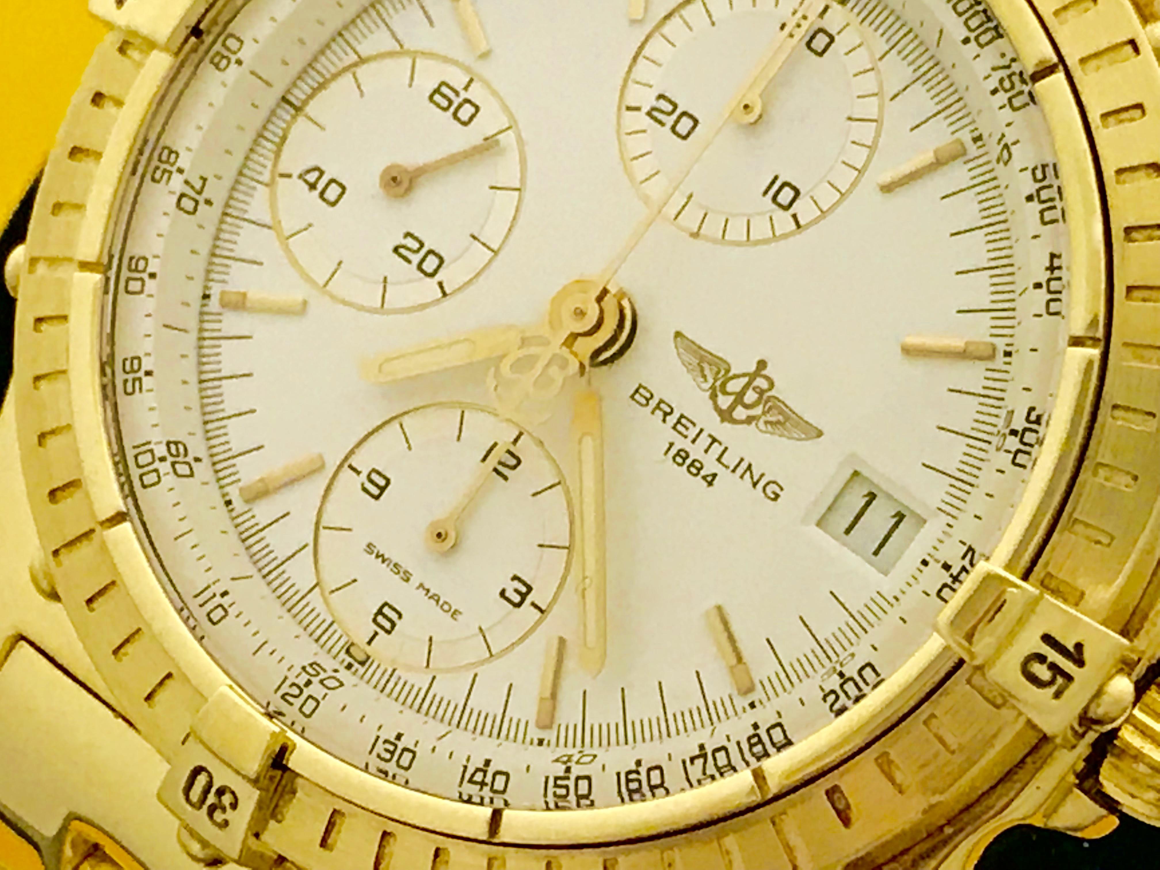 Mens Breitling 18k yellow gold automatic Chronomat Model K13047X. Certified Pre-Owned and ready to ship.  Automatic Winding Movement. White dial with yellow gold hour markers. 18k Yellow Gold case (40mm dia.). 18k yellow gold Breitling Pilot