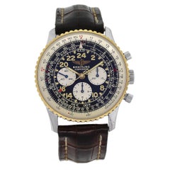 Chronograph-Uhr aus Gelbgold und Edelstahl mit schwarzem Zifferblatt von Cosmonaute