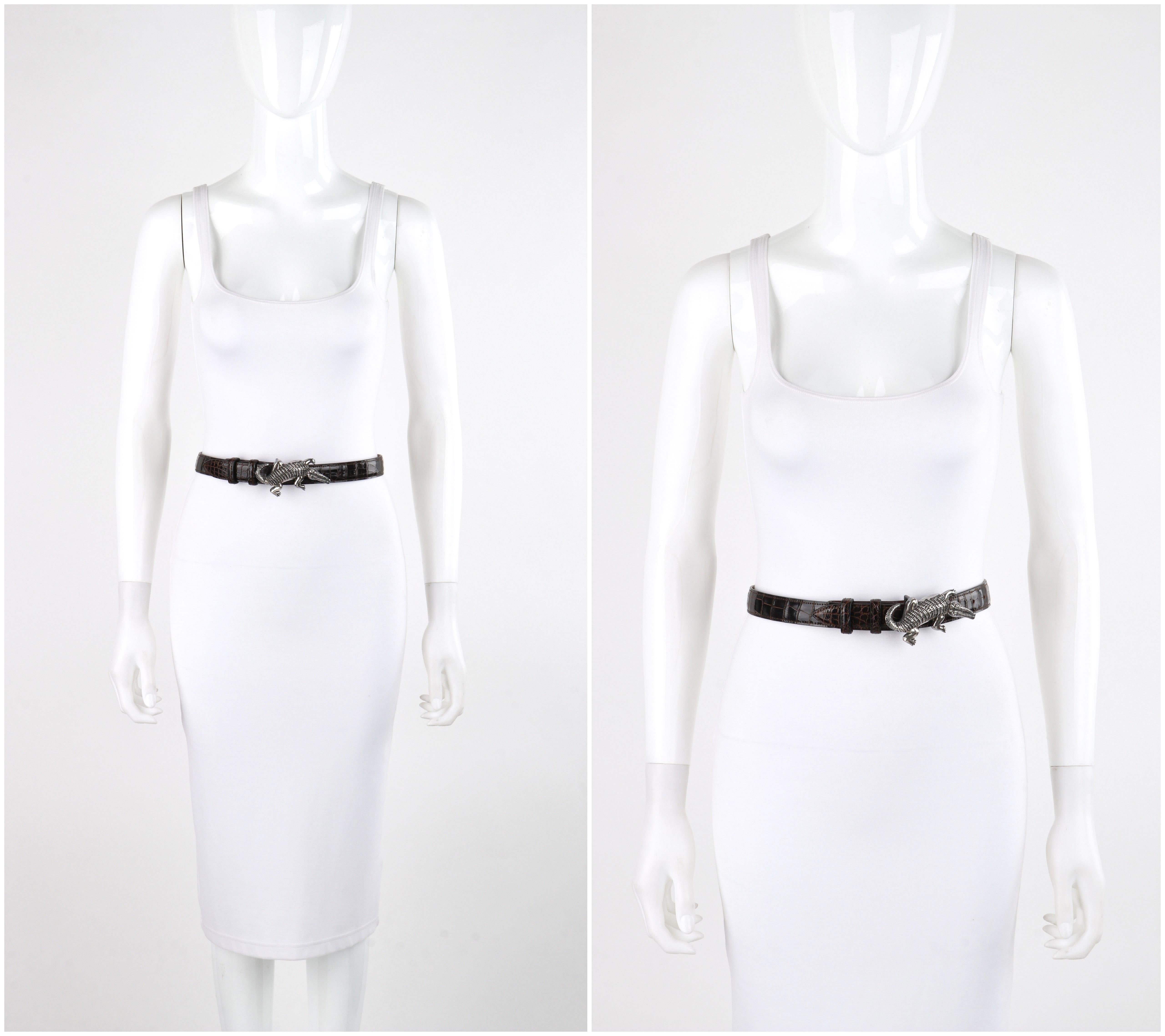Brand / Manufacturer: Brenda Schoenfeld
Designer: Brenda Schoenfeld
Style: Belt
Color(s): Shades of brown, silver
Lined: No
Marked Fabric Content: 