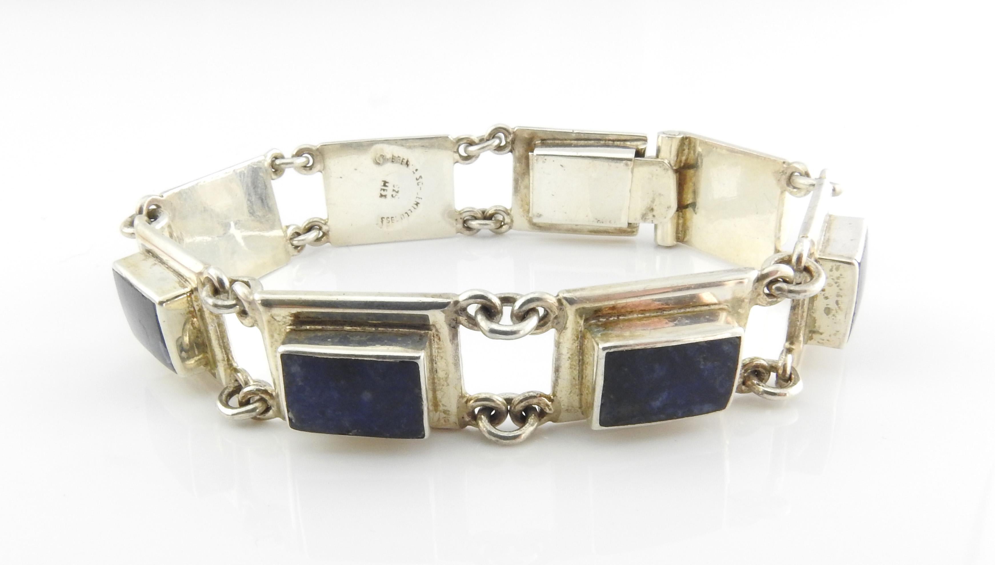 Brenda Schoenfeld Mexico Sterling Silber Lapislazuli Panel Link Armband.

Markiert: BRENDA SCHOENFELD 953,

925 MEX

Größe 7 auf dem Konus des Armbands.

Maße: 7 1/2