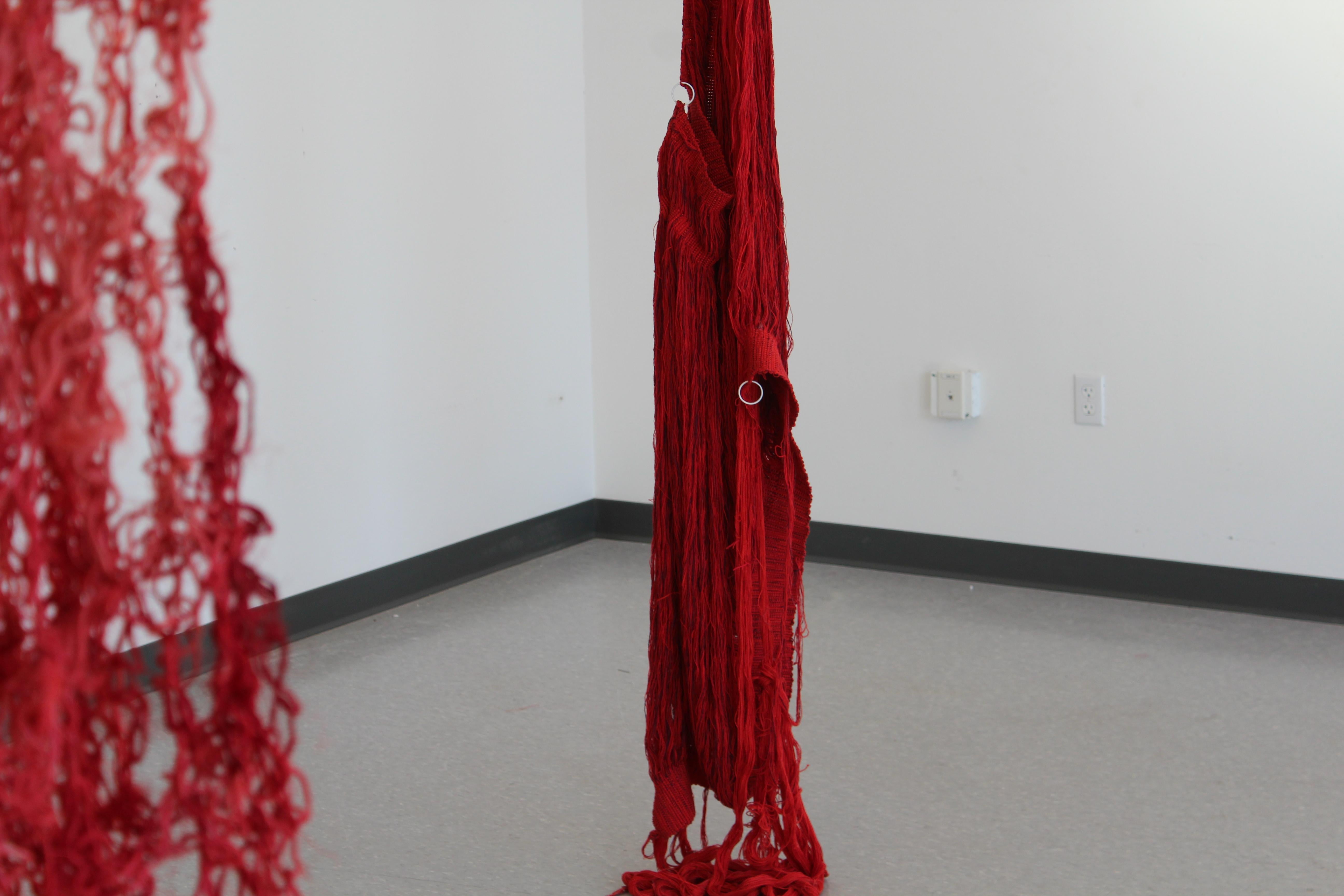 Spillage Pillar, red hanging fiber sculpture, textile art, abstract - Sculpture by Brendan Kenny