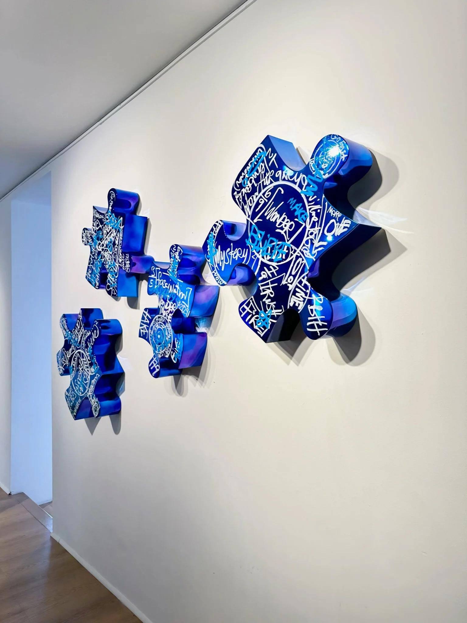 Brendan Murphy
Life is a Jigsaw (Dark Blue), 2021
Signed by artist
Wall sculpture with silver based metallic chrome paint with hand painted formulas
4 piece set
I: 31 x 27 x 5.5 inches
II: 25 x 22 x 5.5 inches
III: 25 x 14 x 5.5 inches
IIII: 27 x