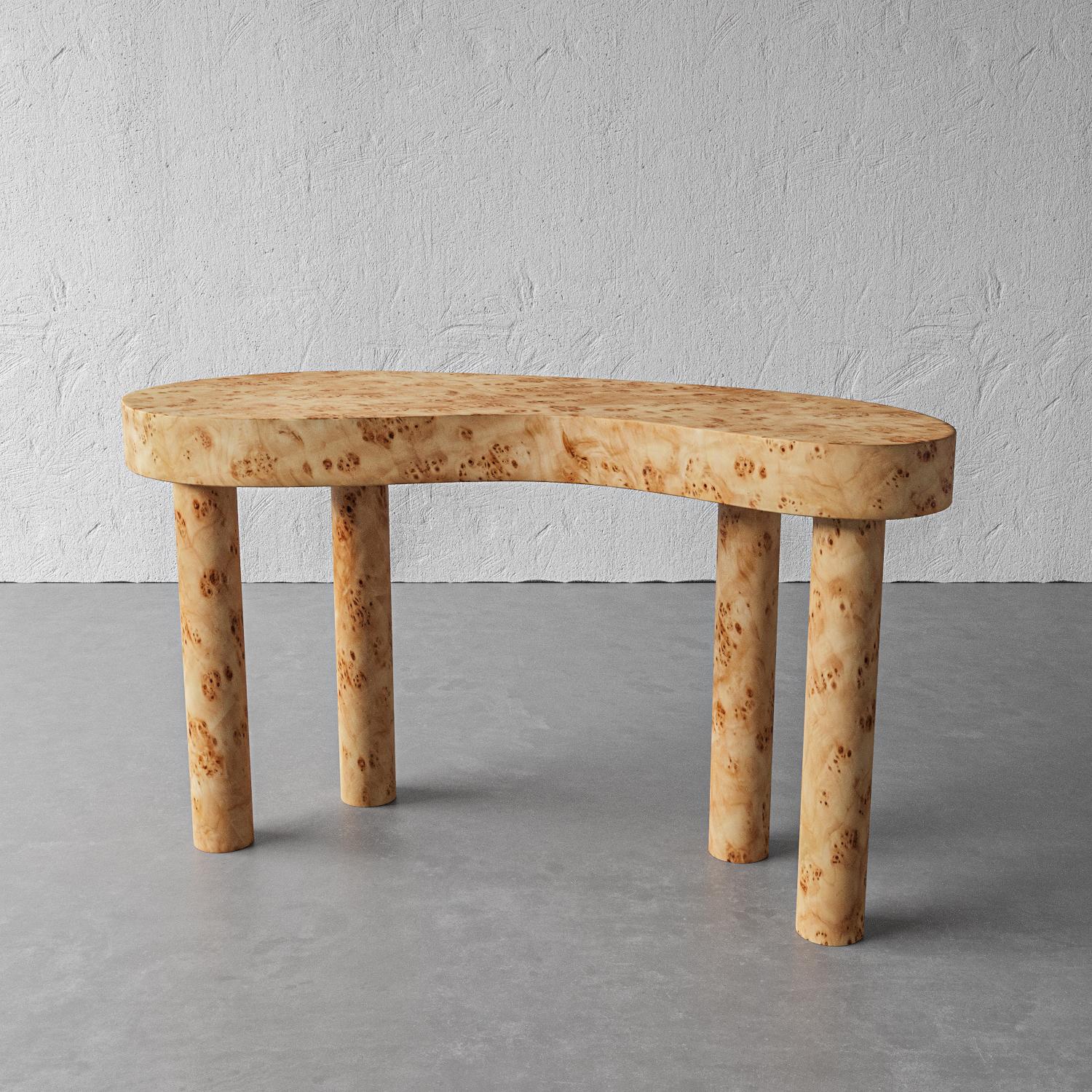 The design continuum continues to evolve in this artistic luxury piece. The iconic kidney shape first appeared as a writing desk or dressing table during the Louis XV period of 16th century France, evolved in the hands of English cabinet makers in