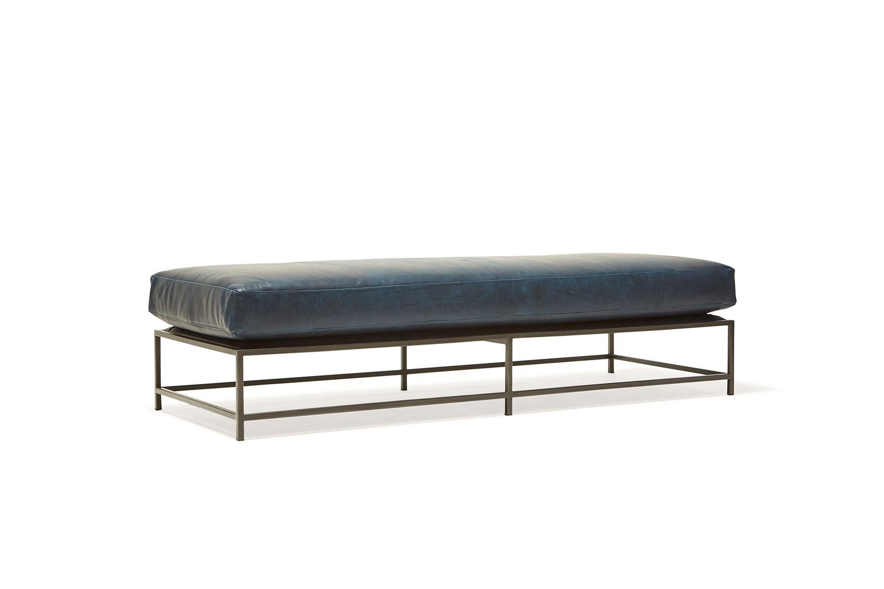 The Inheritance bench is a versatile piece that can be used as a chaise extension on any sofa, as an independent seating option or as a large upholstered coffee table. 

This extra large variation is upholstered in Brentwood Navy leather by Moore