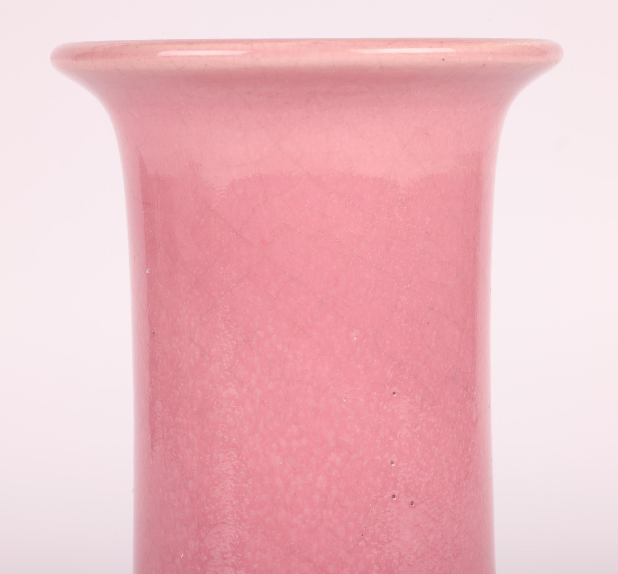 A stylish Bretby Arts & Crafts pink glazed vase in the manner of Christopher Dresser made by renowned potter Henry Tooth and dating from around 1895. 

The vase is part of a private collection of Arts and Crafts influenced pottery amassed in the mid