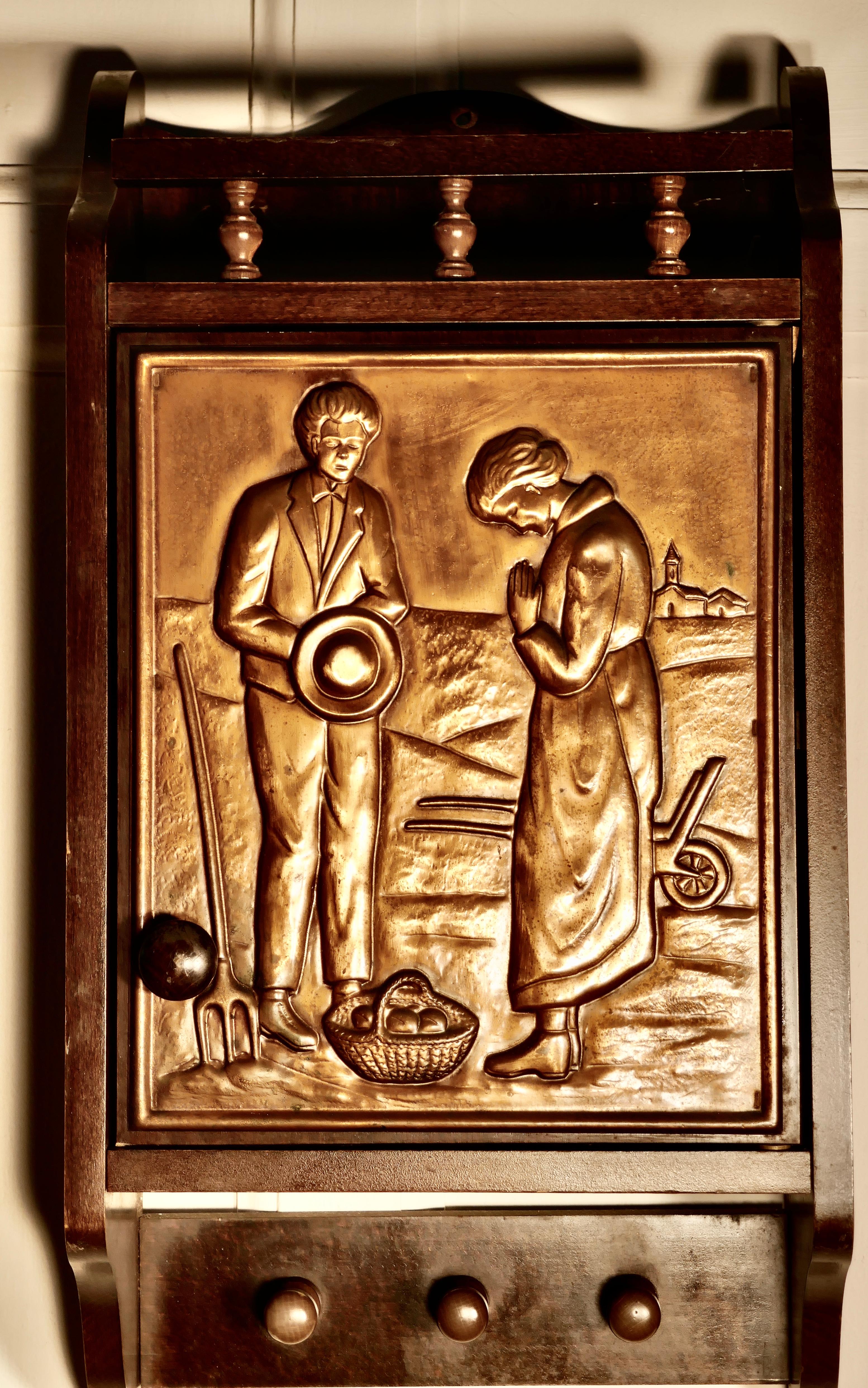 Bretton Arts & Crafts copper cloakroom wall cabinet

A great little piece of local Arts & Crafts furniture from Brittany, made in wood with a delightful copper picture panel in the front depicting a gardener giving a basket of produce to a rather