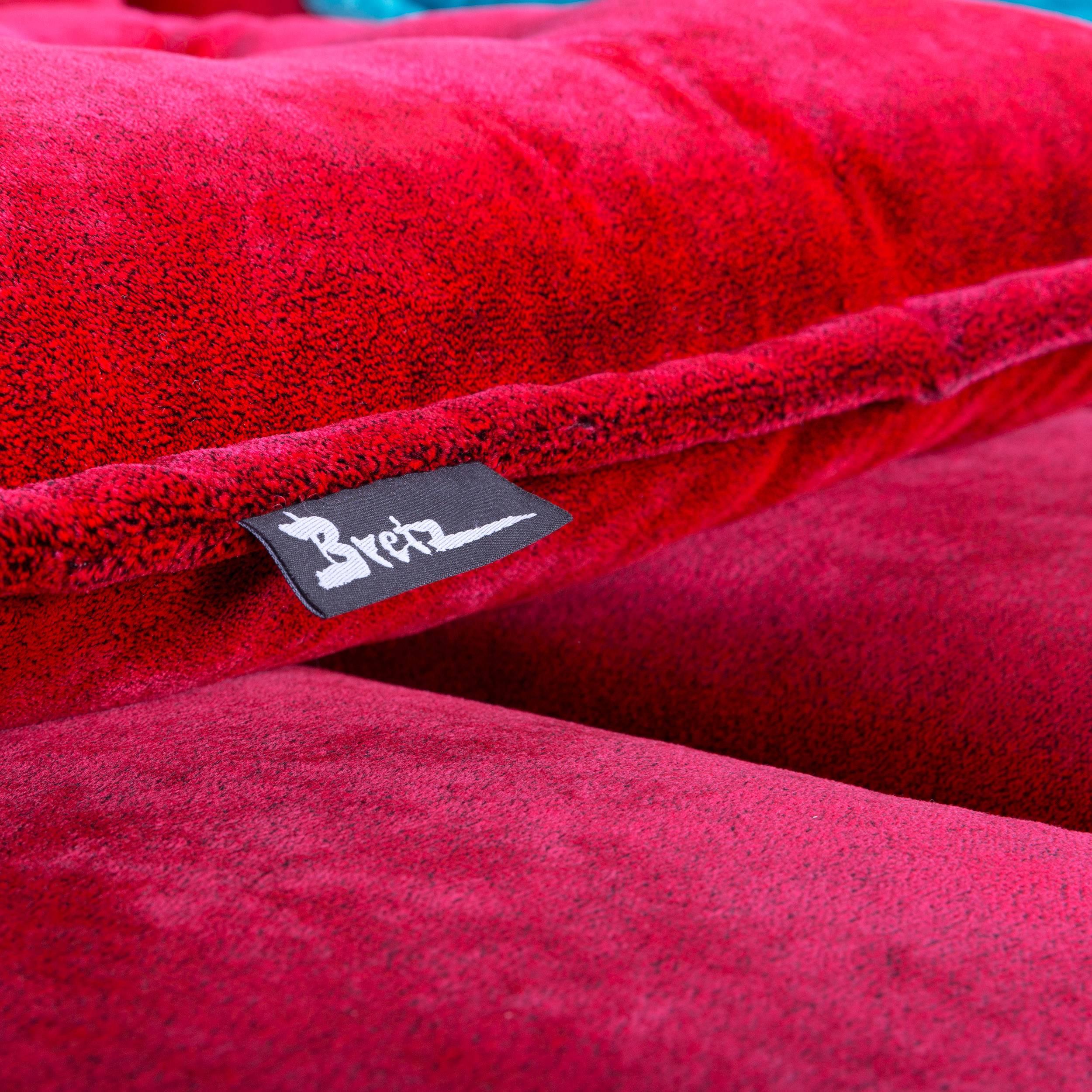 Red colored original bretz cloud 7 designer sofa, in a minimalistic and modern design, made for pure comfort and style.