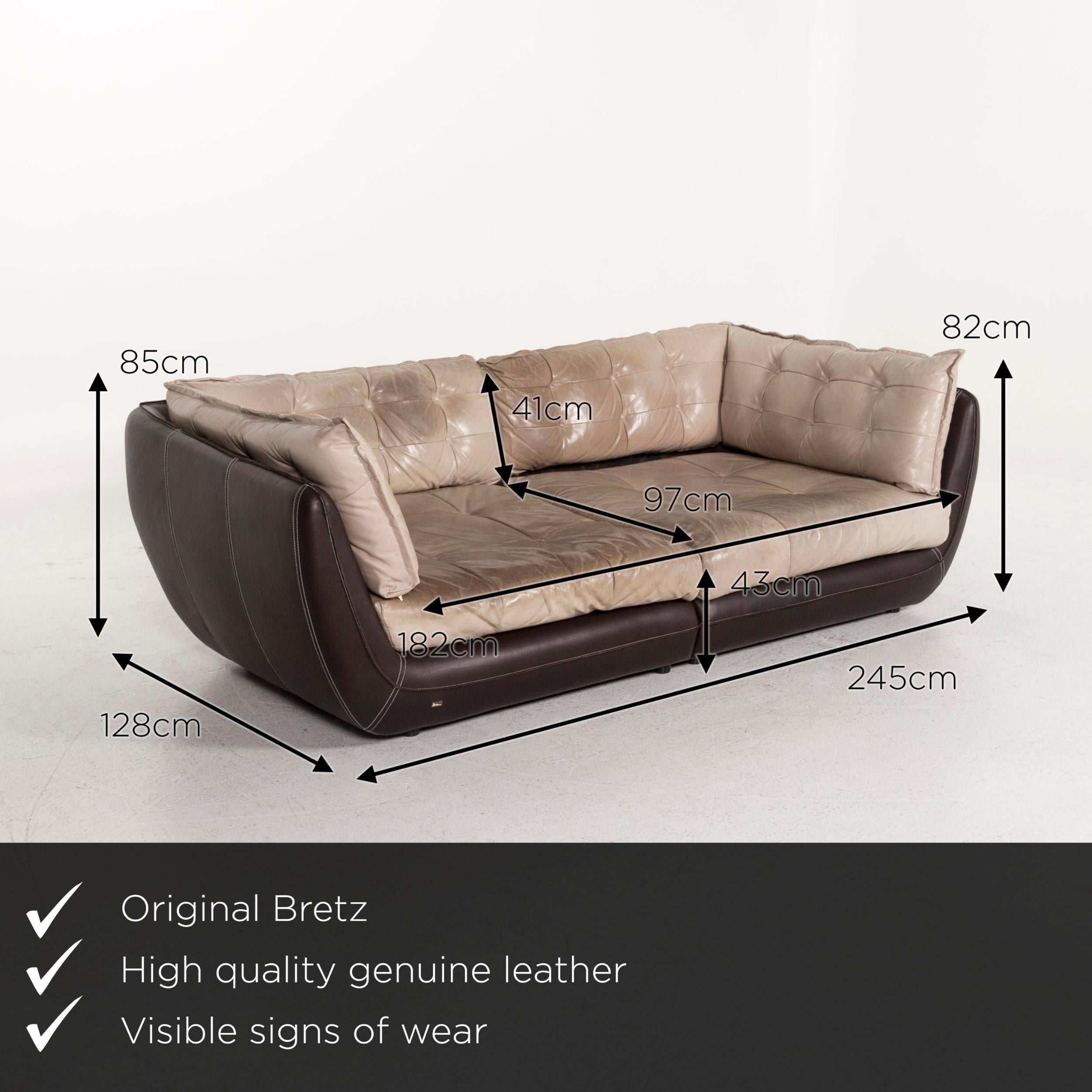 Wir präsentieren Ihnen ein Bretz cupcake Jepard Ledersofa braun-beige mit vier Sitzplätzen.


 Produktabmessungen in Zentimetern:
 

Tiefe 128
Breite 245
Höhe 85
Sitzhöhe 43
Resthöhe 82
Sitztiefe 97
Sitzbreite 182
Rückenhöhe 41.
 