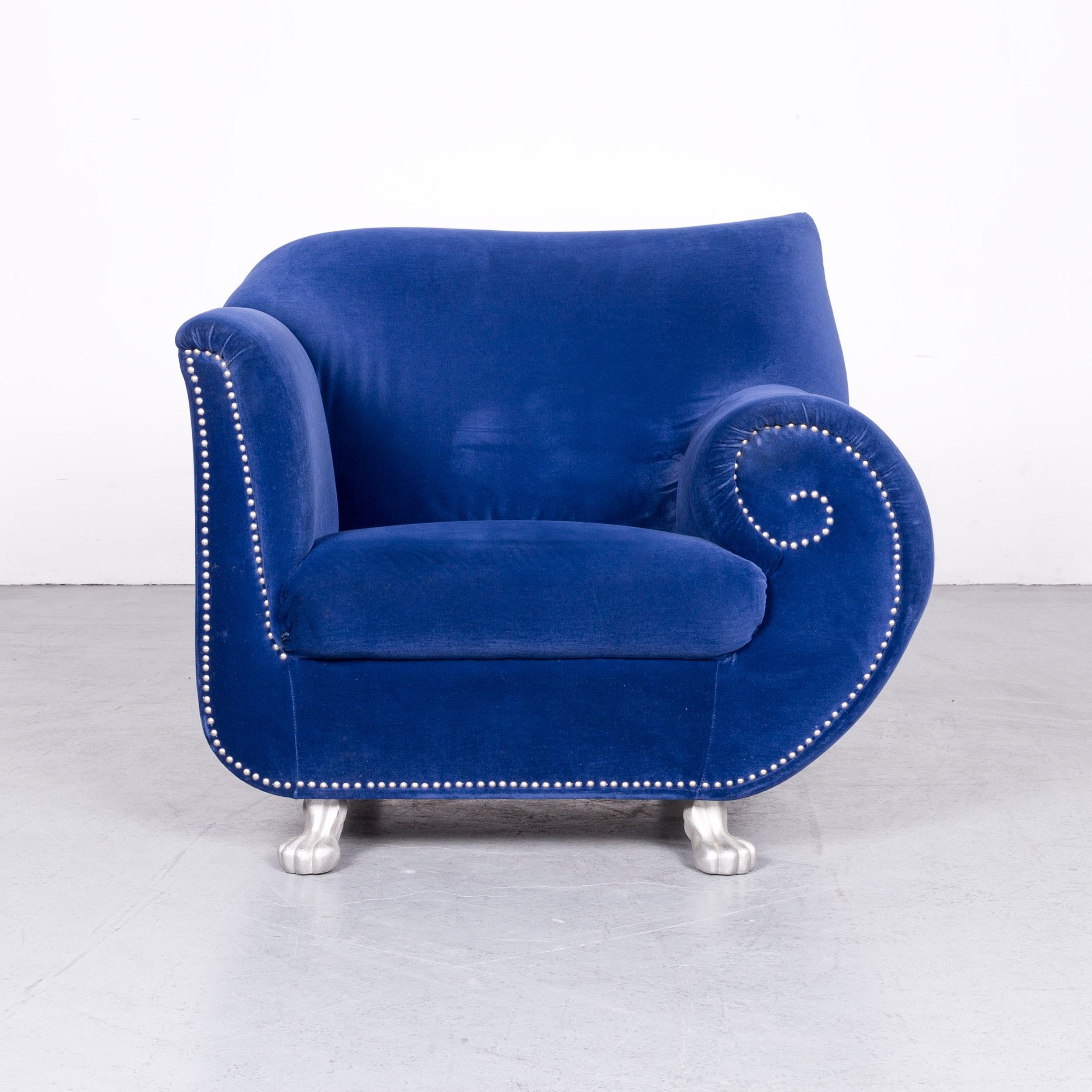 We bring to you a Bretz Gaudi designer velvet fabric armchair blue one-seat chair.



























