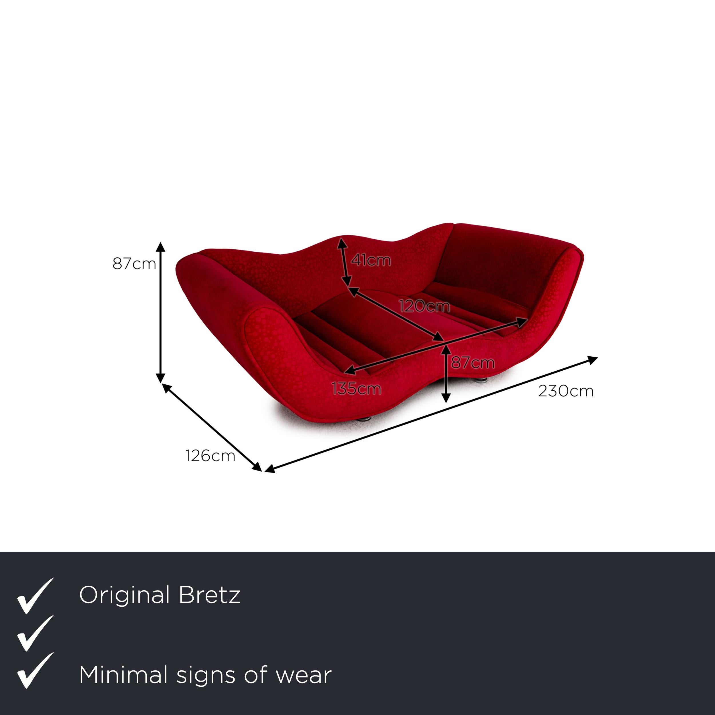 We present to you a Bretz Laola Hookipa fabric sofa red two-seater couch.

Product measurements in centimeters:

depth: 126
width: 230
height: 87
seat height: 87
rest height: 100
seat depth: 120
seat width: 135
back height: 41.

 