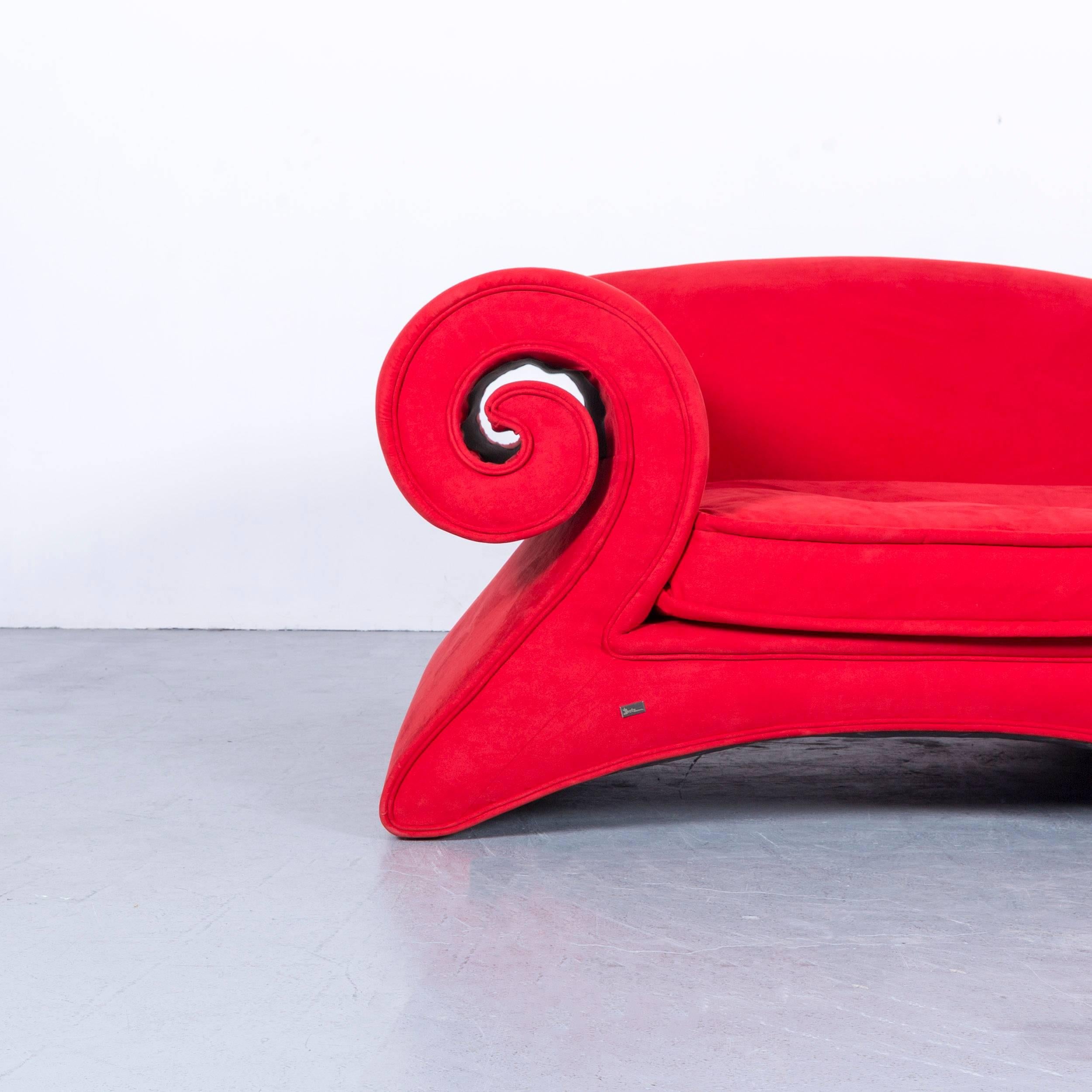 We bring to you an Bretz Mammut fabric sofa red three-seat couch.


















































































