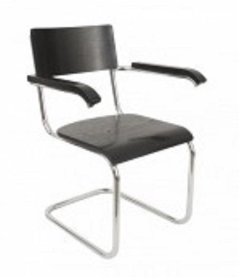 German Art Deco black enameled wood arm chair with chrome trim having a shaped wood back and cane seat (attributed to MARCEL BREUER; manufactured by THONET) (Related item: 061133)
