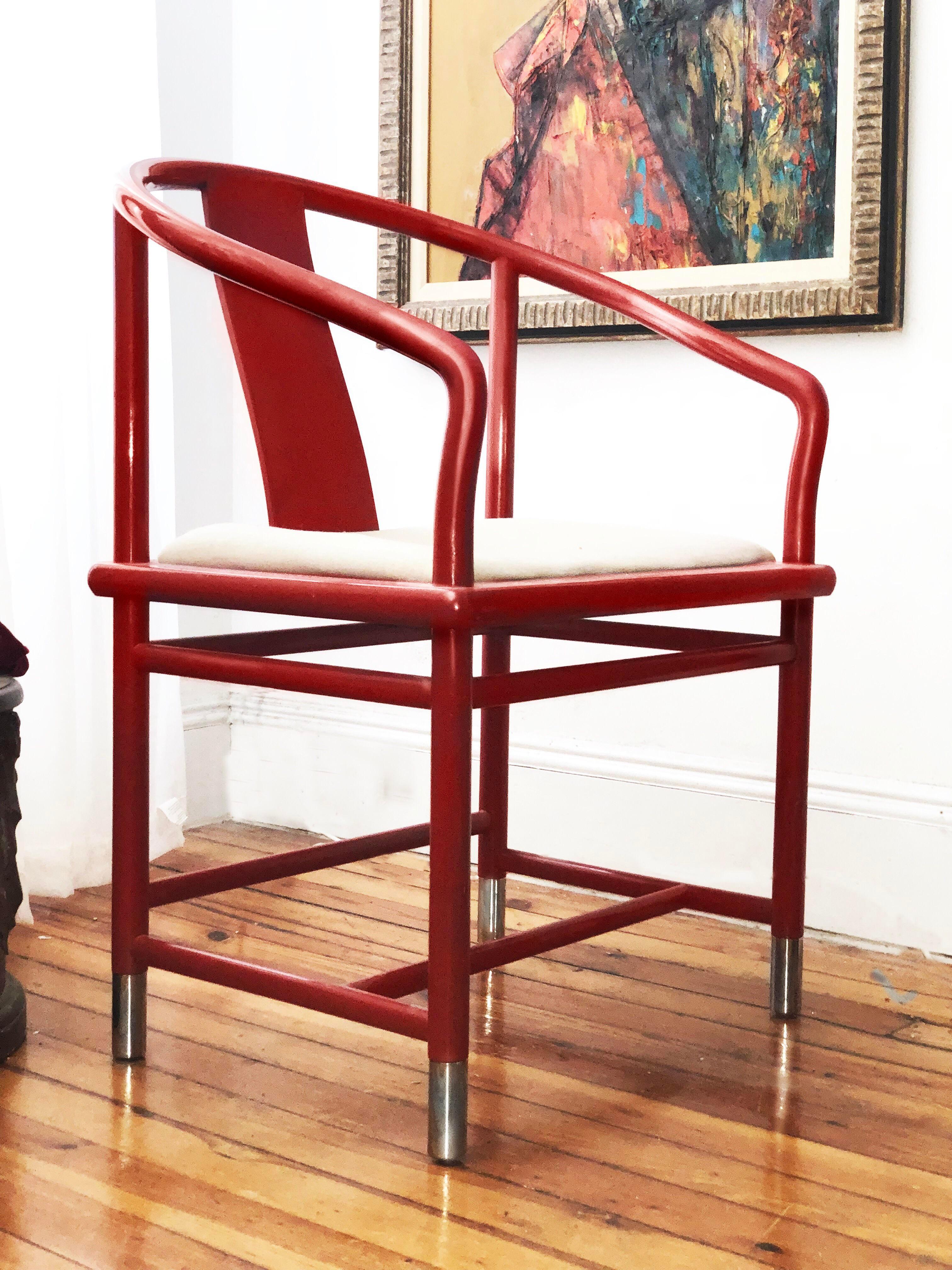Gorgeous Ming-inspired armchairby Brueton. lipstick, red sinuous line that meet the ground with a chromed steel cuff on each the foot. Show stopper.. I would recommend reupholstering. Current linen type of fabric is in ok condition, shows some wear