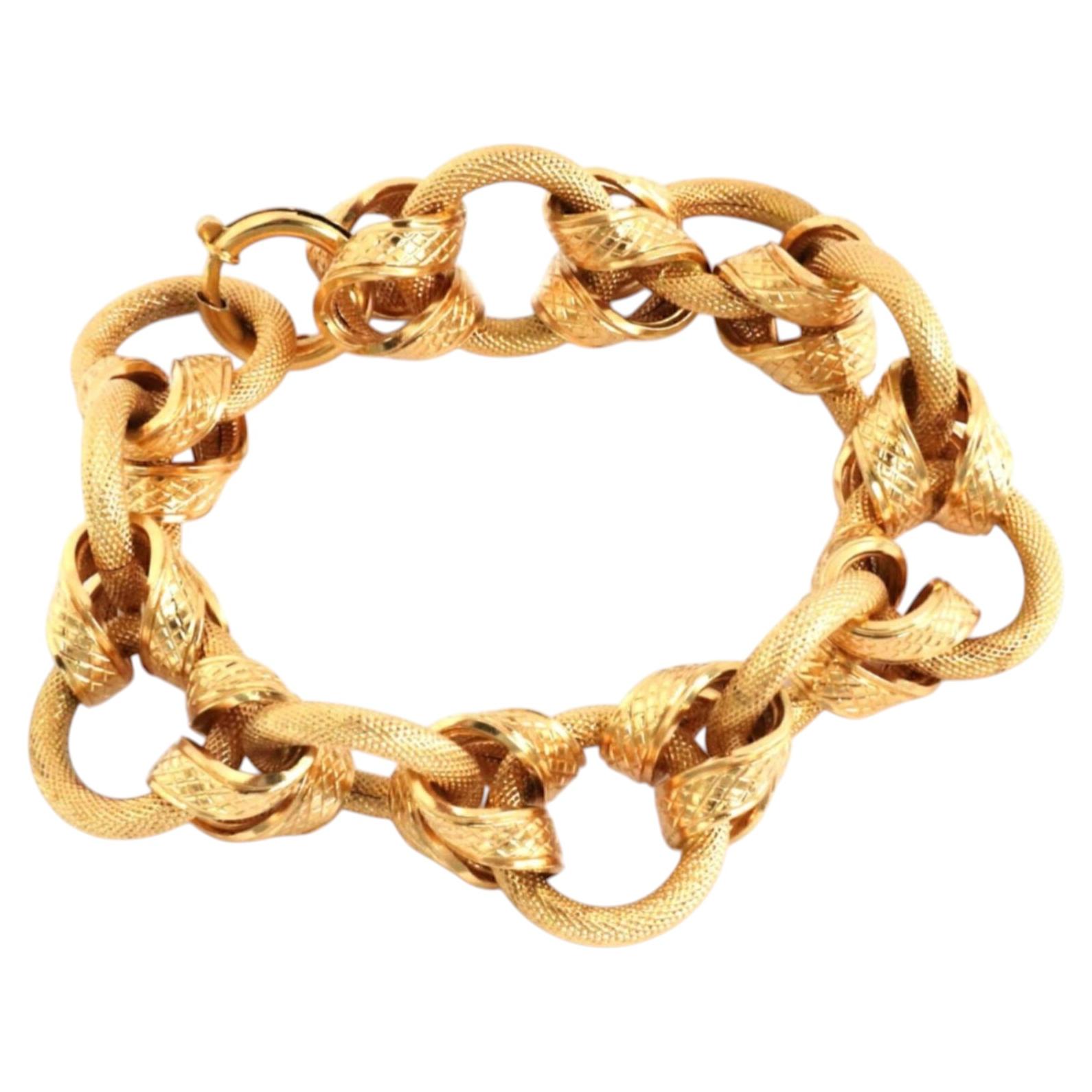 Brev Pulsera de eslabones entrelazados de oro amarillo de 18 quilates con diseño de piel de serpiente texturizada en venta