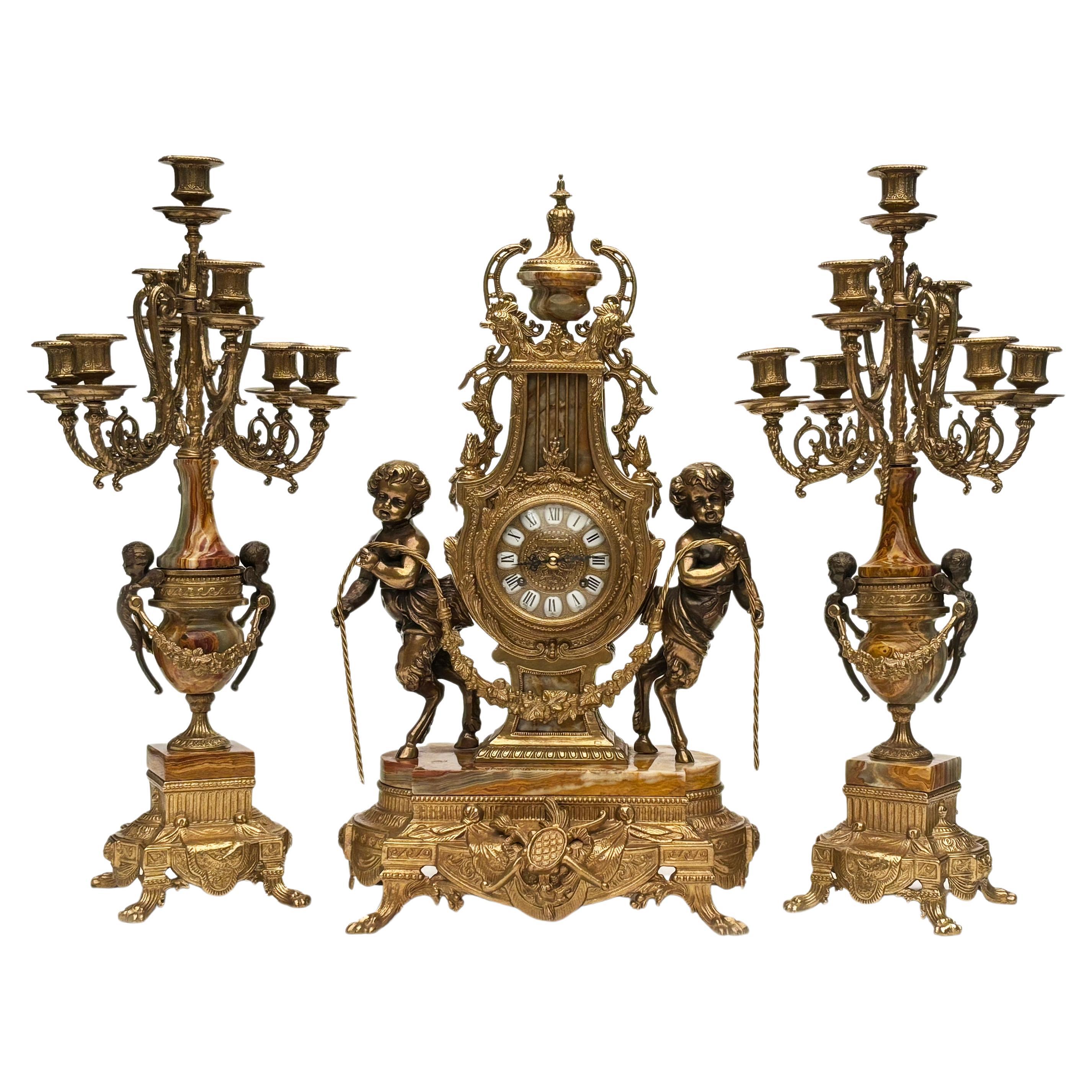 Brevettato Brass and Marble Italian Clock and Candelabras For Sale