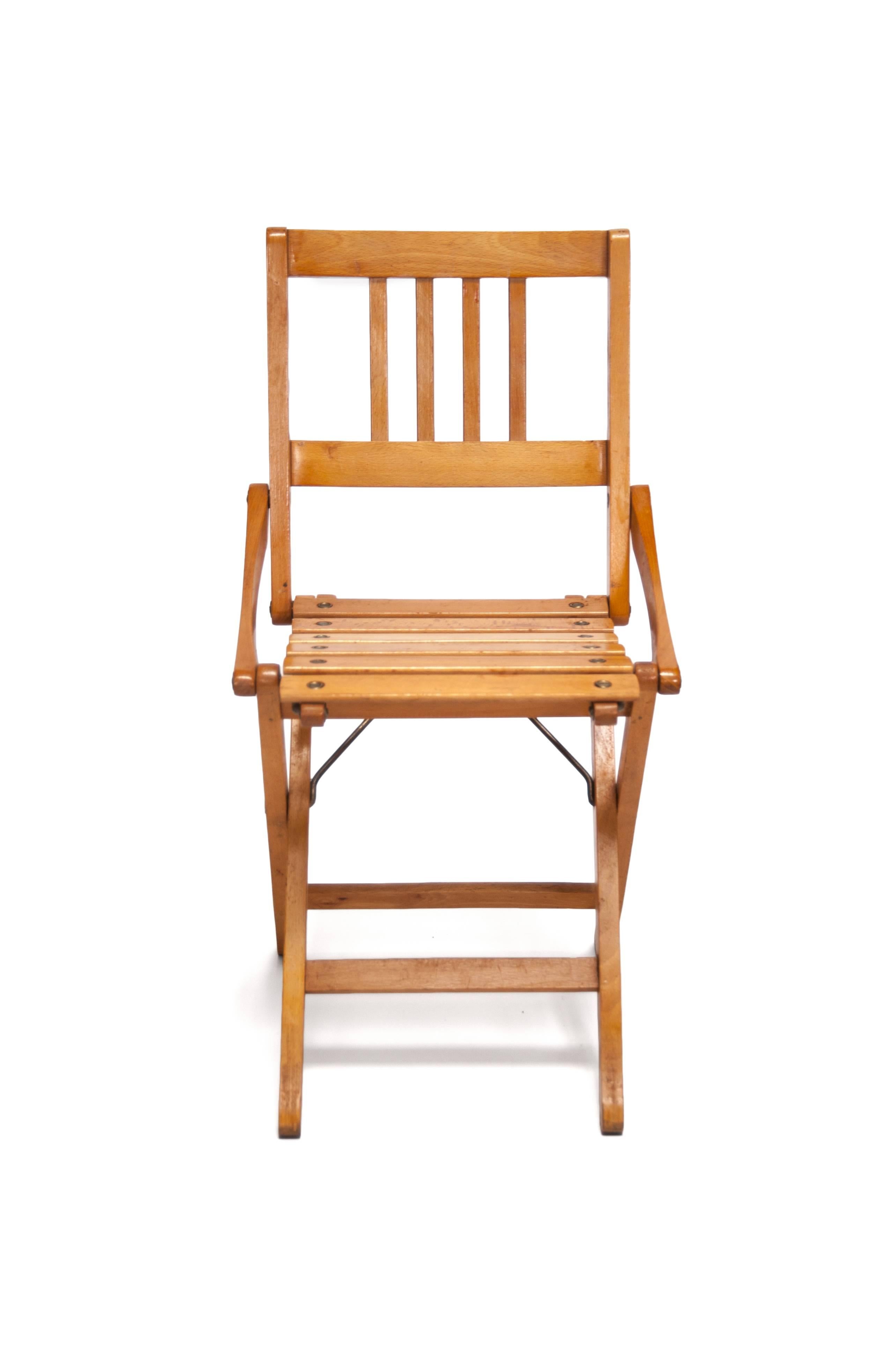 Brevetti Reguitti folding child chair by Fratelli Reguitti, Italy, 1940s

Brevetti Reguitti folding child chair
Fratelli Reguitti, Italy, 1940s
Maple wood
Measures: H 25.5 in, W 12.25 in, D 14.75 in (seat H 14.5 in).