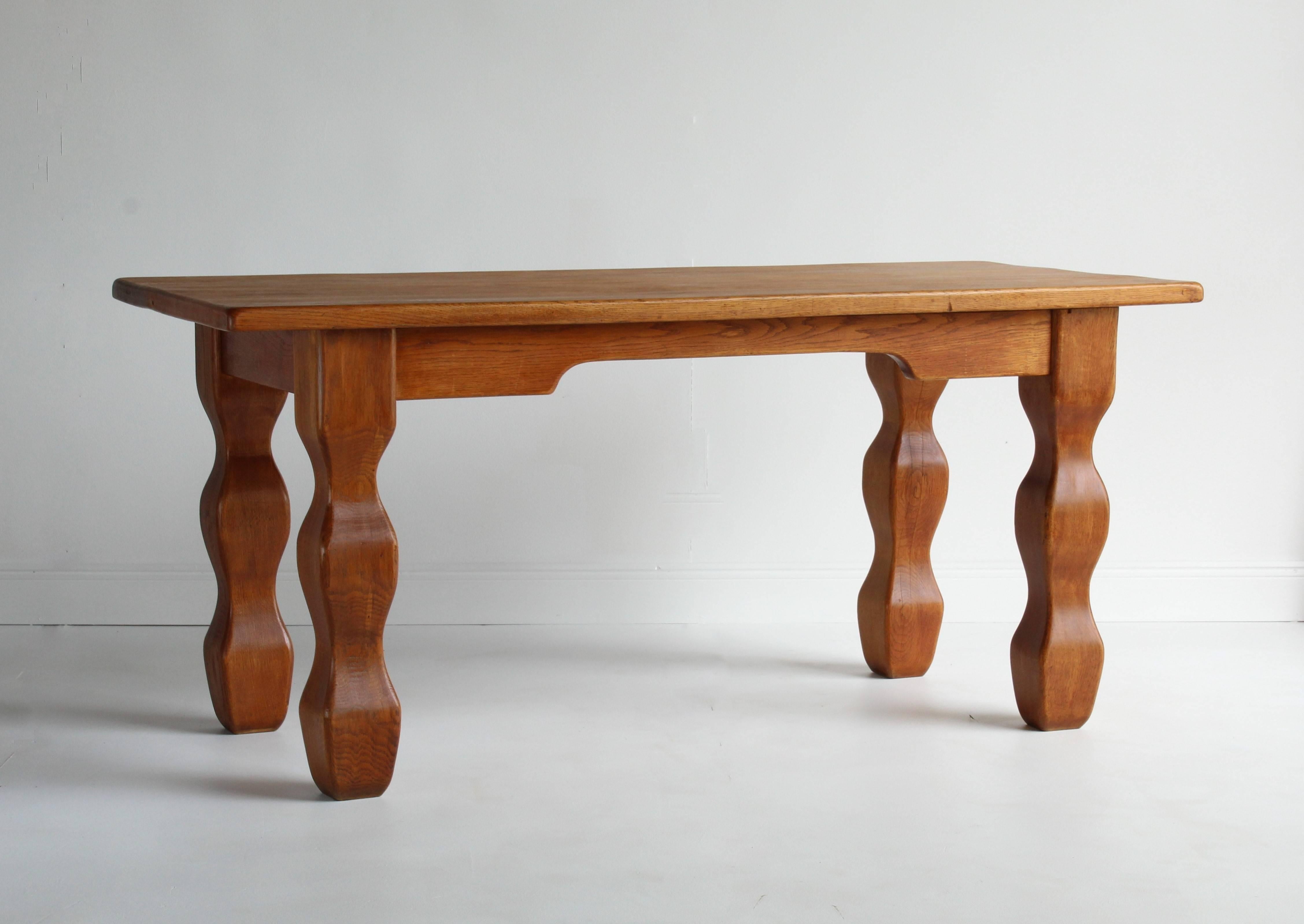 A unique, modernist oak desk / library table by Danish cabinetmaker Børge Clausen. Made in the studio of the artist, Denmark, 1940s. 

The absence of drawers gives the desk a pure and sculptural appearance. Clausen's reductionist approach and the