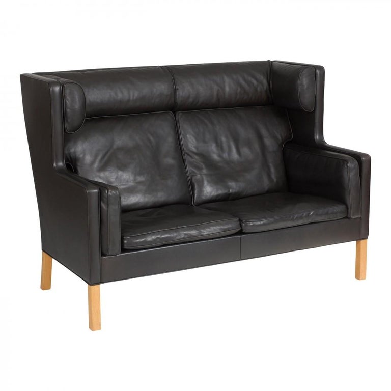 Børge Mogensen 2 pers Coupé sofa with black patinated leather and oak wood  legs For Sale at 1stDibs
