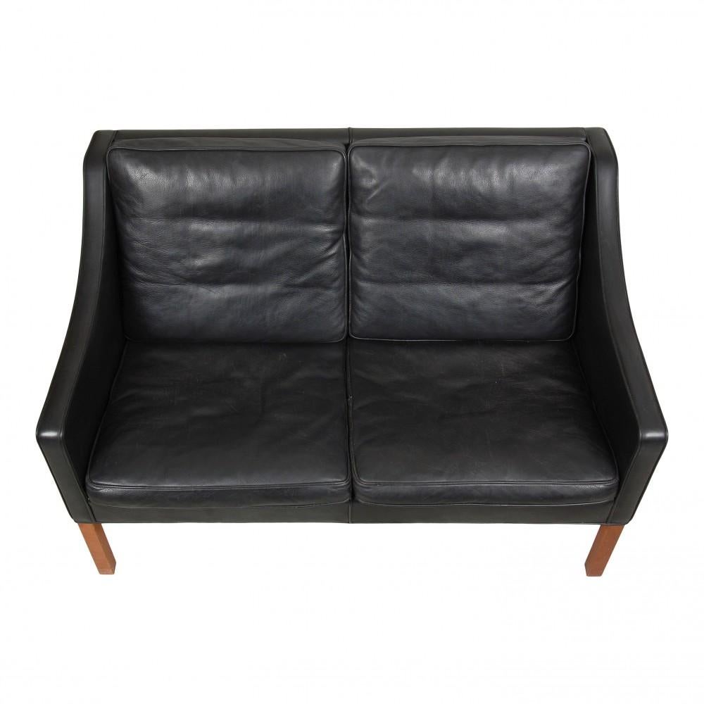 Børge Mogensen 2-seater sofa model 2208 with its original black patinated leather. The sofa is supposedly from the 80s-90s, and appears with patinated leather.