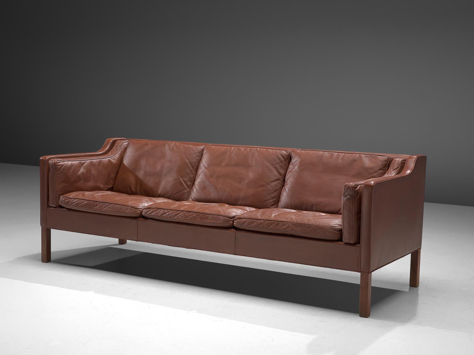 Børge Mogensen for Fredericia Stolefabrik, 3-seater sofa BM2213, leather and stained oak, Denmark 1962. 

Very well conditioned 3 seater sofa from Børge Mogensen. This model was designed by Mogensen for his own home, in his goal to create the