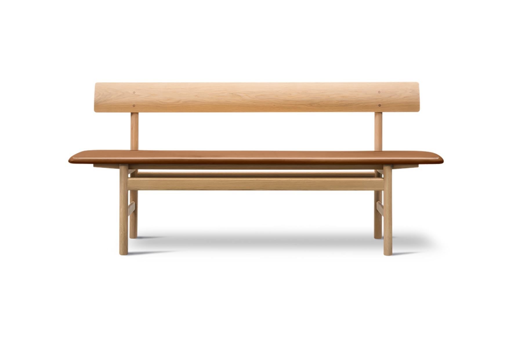 Børge Mogensen designed this solid wood dining bench in 1956. With its robust simplicity the bench is an ideal example of Mogensen’s lifelong drive for a purified shape.