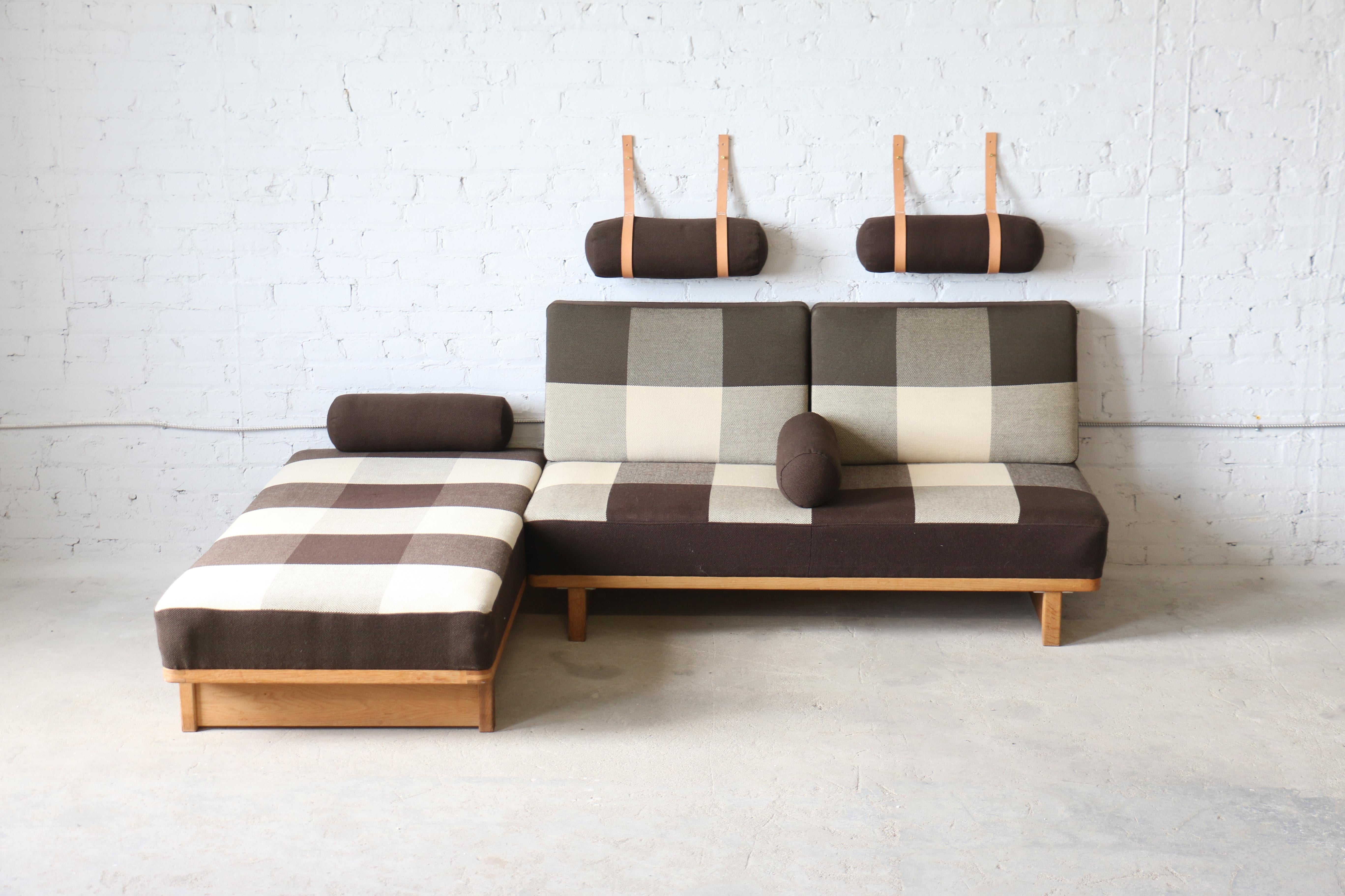 A rare pair of sofas/daybeds designed by Børge Mogensen for Fredericia A/S. Originally designed in a larger version for Erhard Rasmussen, this awesome sofa set is truly unique. It is nicknamed the 