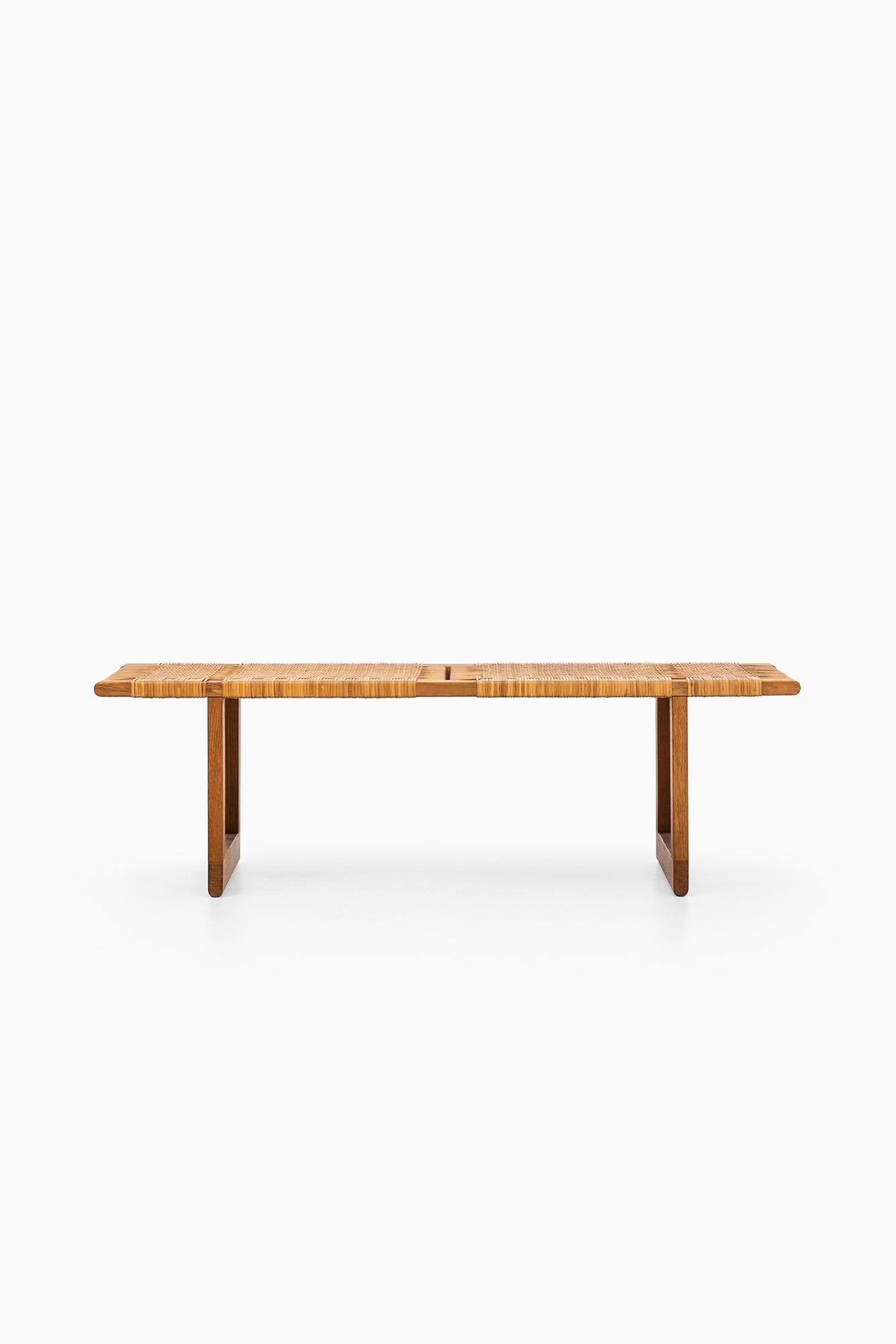 Very rare bench in oak and cane designed by Børge Mogensen. Produced by Erhard Rasmussen in Denmark.