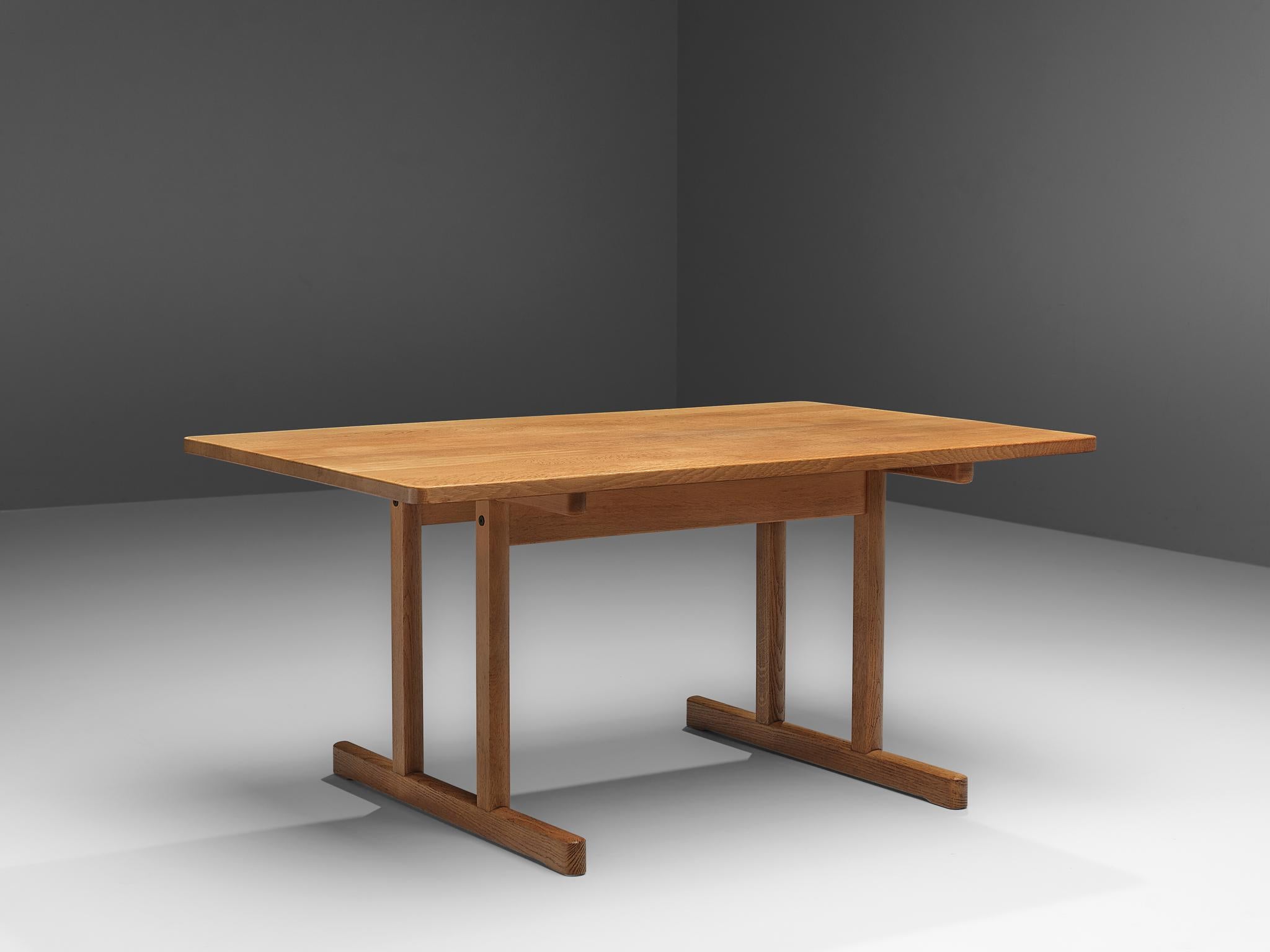Børge Mogensen for Fredericia Stolefabrik, dining table, model 6289, oak, Denmark, 1966

Børge Mogensen designed this dining table in 1966 for Fredericia Stolefabrik. The table is made out of solid oak. The rectangular tabletop is hold by a pair of