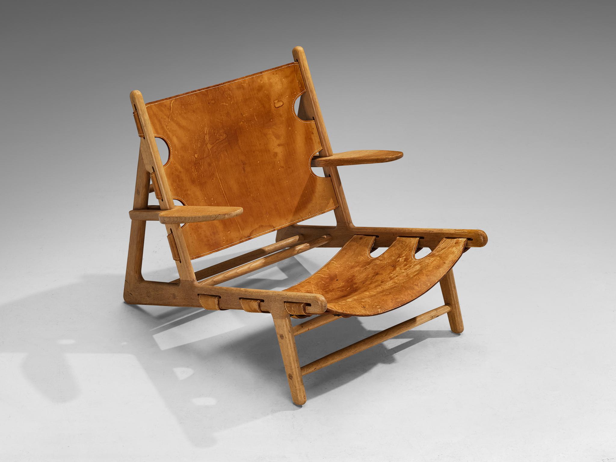 Børge Mogensen for Federicia model 'Hunting Chair', Sweden, 1960s

Hunting chair, designed by Børge Mogensen in 1950 for the Cabinetmakers Guild Exhibition. The theme of the exhibition was 'Huntin Cabin'. Therefore Mogensen created this chair,