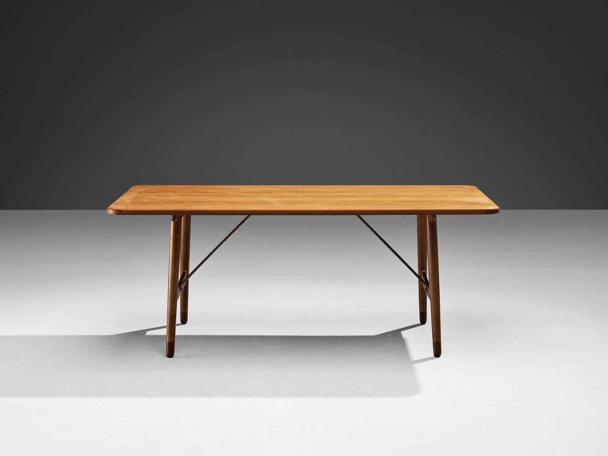 Børge Mogensen for Frederica Stolefabrik, hunting table, oak, teak, brass Denmark, circa 1960. 

This table with a teak top and oak frame is designed by Børge Mogensen. The table, nicknamed the Hunting table, is originally designed by Mogensen for