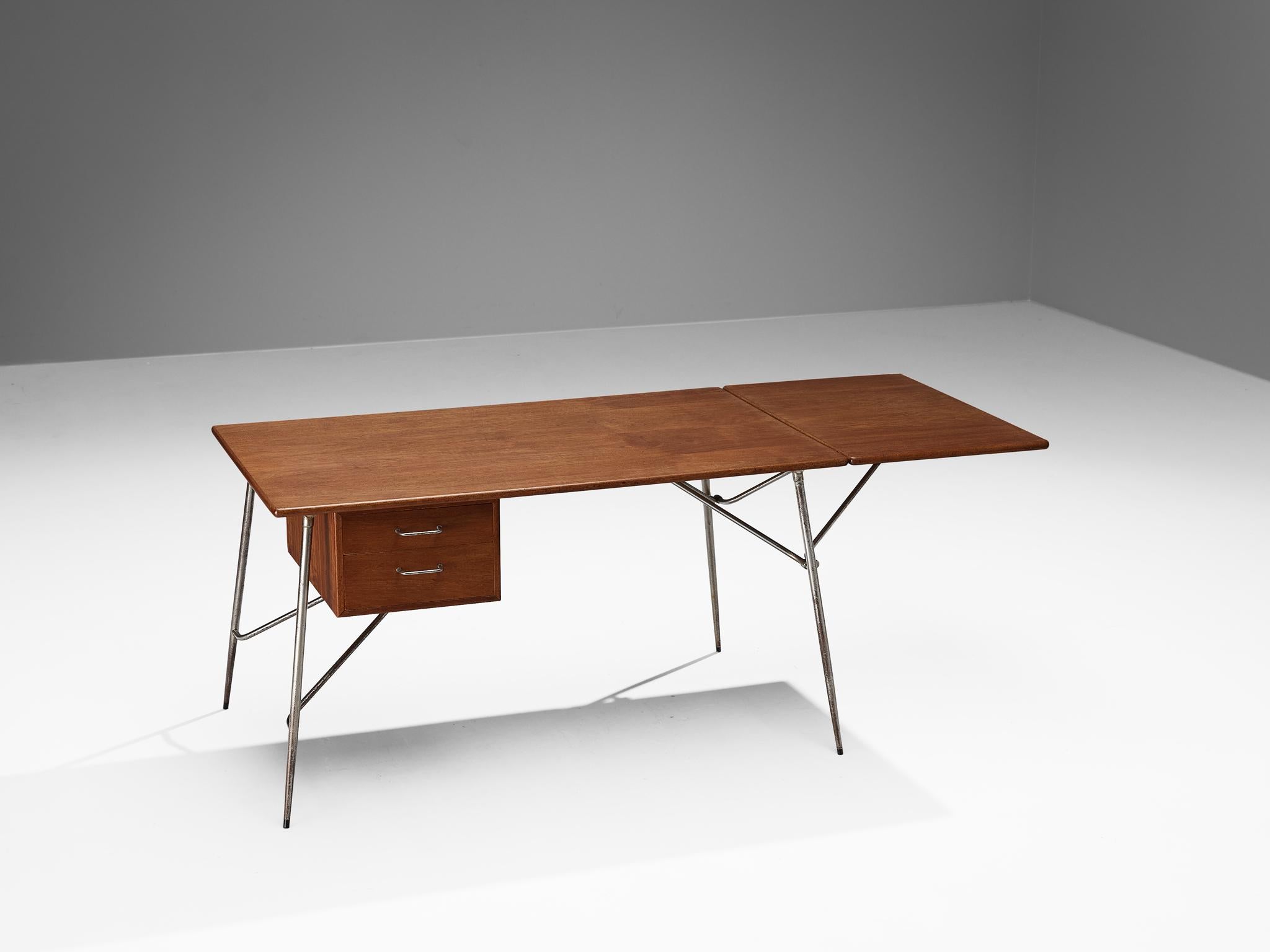 Børge Mogensen for Søborg Møbelfabrik, desk, model '203', teak and steel, Denmark, 1953.

This Scandinavian modern desk features an open construction with clear lines and angular shapes dominating the layout. The tabletop and drawer compartment