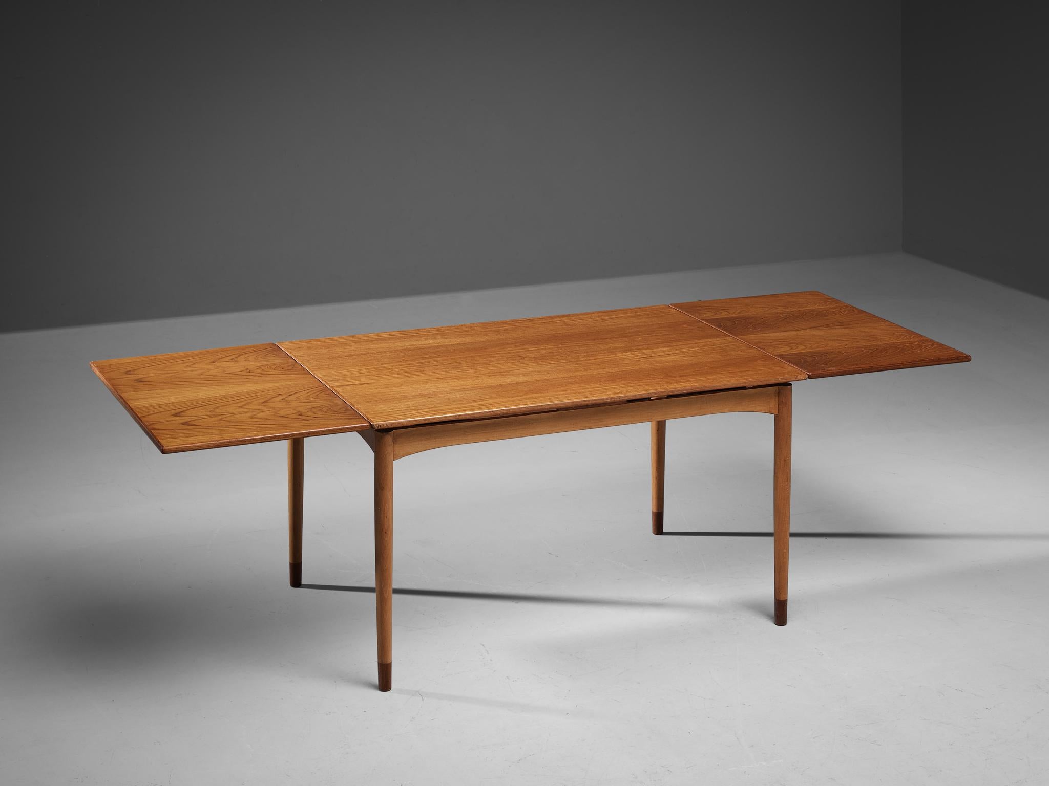 Børge Mogensen for Søborg Møbelfabrik, extendable dining table, model 153, teak, Denmark, 1952. 

This extendable dining table is characterized by a strong and solid construction executed in teak. This is realized by the sharp and clear lines which
