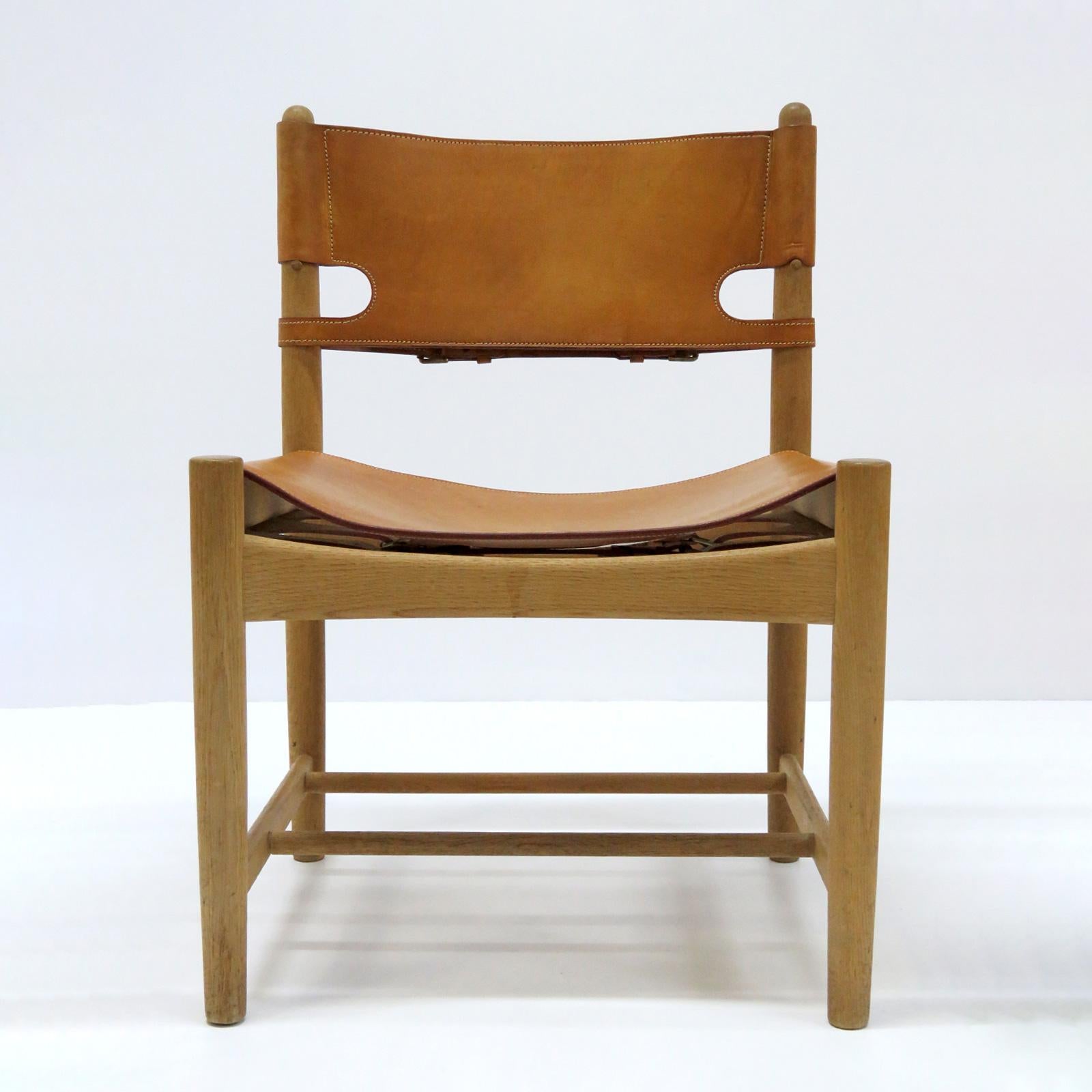 Wonderful set of eight Børge Mogensen 'Hunting' chairs, model no. 3237 for Fredericia Furniture, with saddle leather on oak frames, great patina.