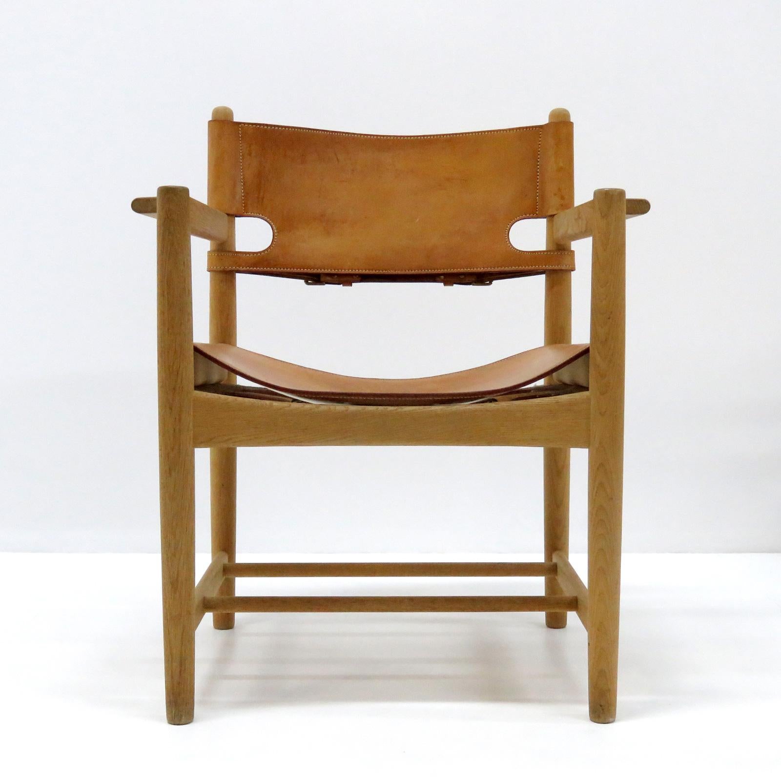 Wonderful pair of Børge Mogensen 'Hunting' chairs, model no. 3238 for Fredericia Furniture, with saddle leather on oak frames, great patina, part of a set of 10 chairs, partially marked.