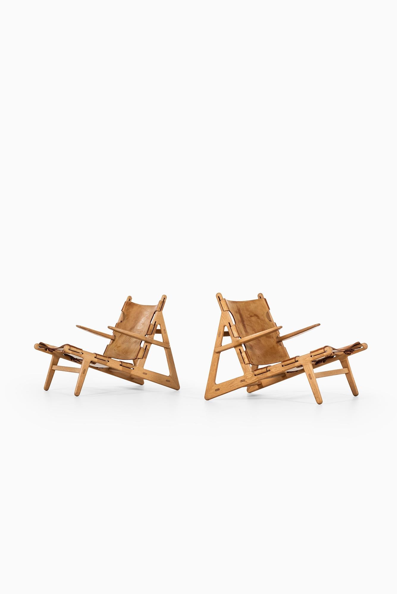 Rare pair of hunting easy chairs designed by Børge Mogensen. Produced by Fredericia Stolefabrik in Denmark.