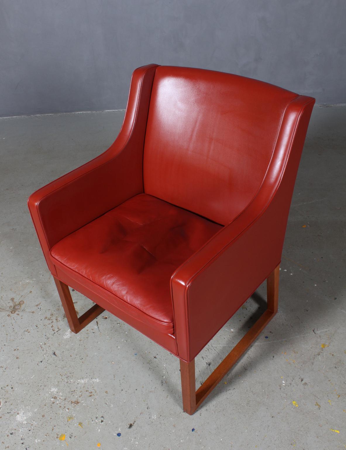 Børge Mogensen lounge chair original upholstered with red leather.

Legs of mahogany.

Model 3246, made by Fredericia Furniture.