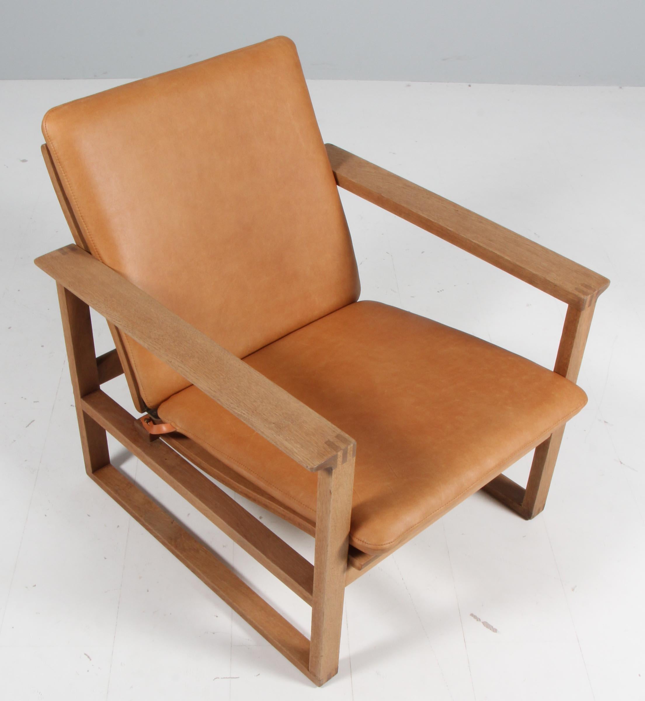 Børge Mogensen lounge chair new upholstered with vintage aniline leather.

Frame of soap treated oak.

Model 2256, made by Fredericia furniture.
