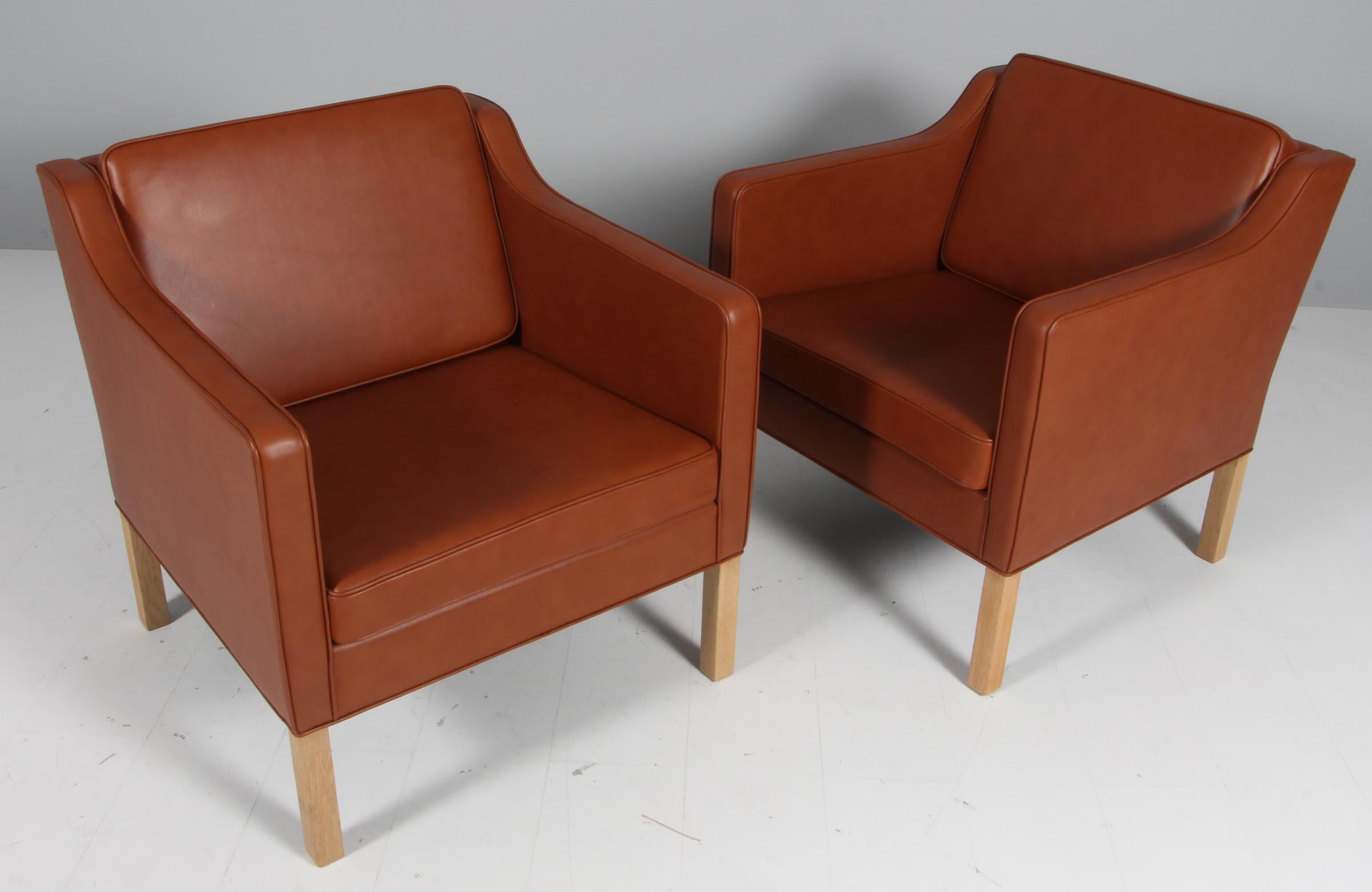 Børge Mogensen lounge chair new upholstered with cognac pure full grain aniline leather.

Legs of oak.

Model 2321, made by Fredericia Furniture.
