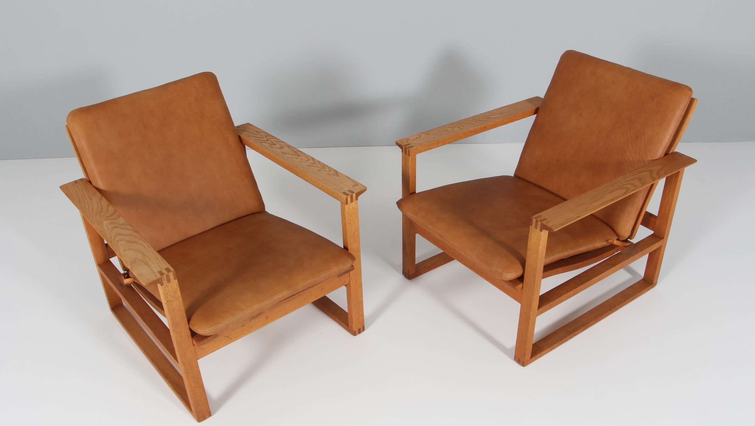 Børge Mogensen lounge chairs new upholstered with vintage aniline leather.

Frame of oak.

Model 2256, made by Fredericia furniture.