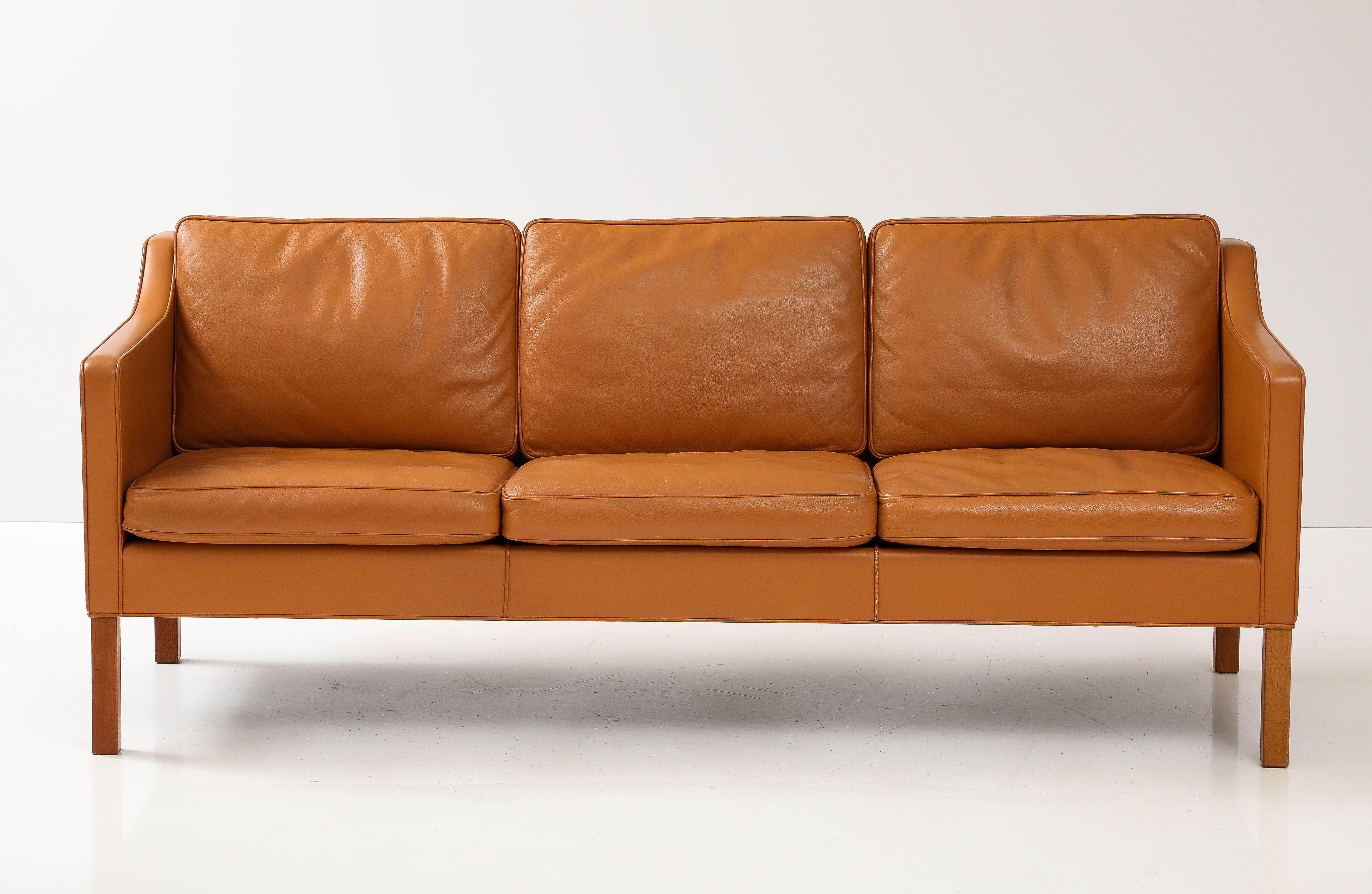 Full Thick Grain Bison Leather.  Desirable Scandinavian cognac color.  Three Seat Sofa. Labelled underneath.  