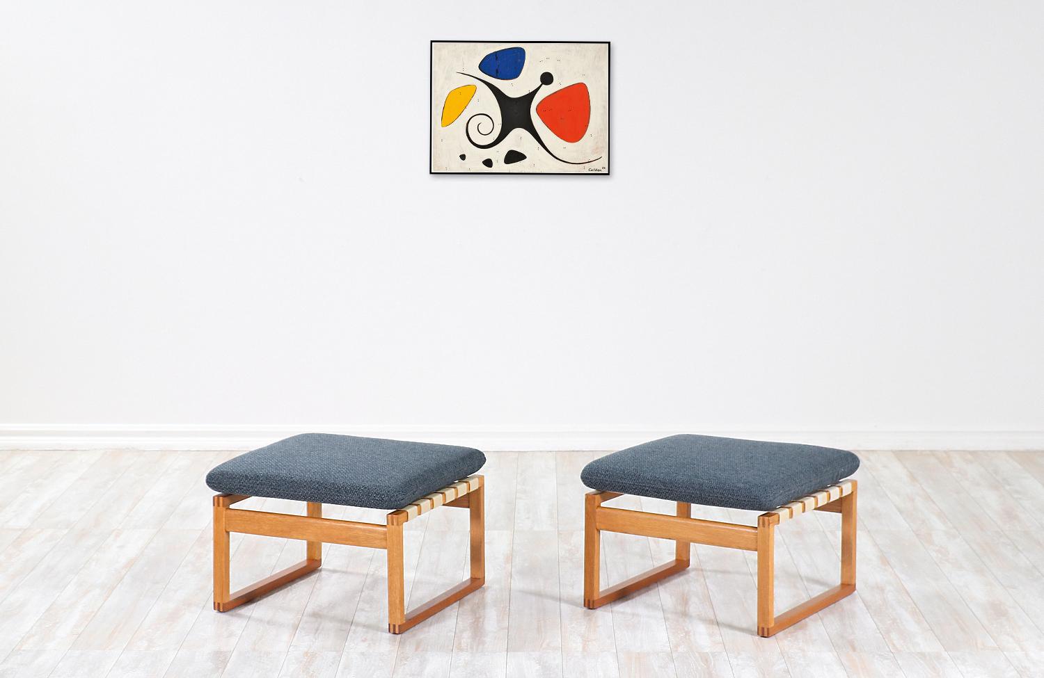 Versatile pair of Model 2248 stools designed by brilliant Danish architect Børge Mogensen in collaboration with the workshop of Fredericia Stolefabrik in Denmark during the 1950s. Mogensen's philosophy for this line was servicing functionalism and