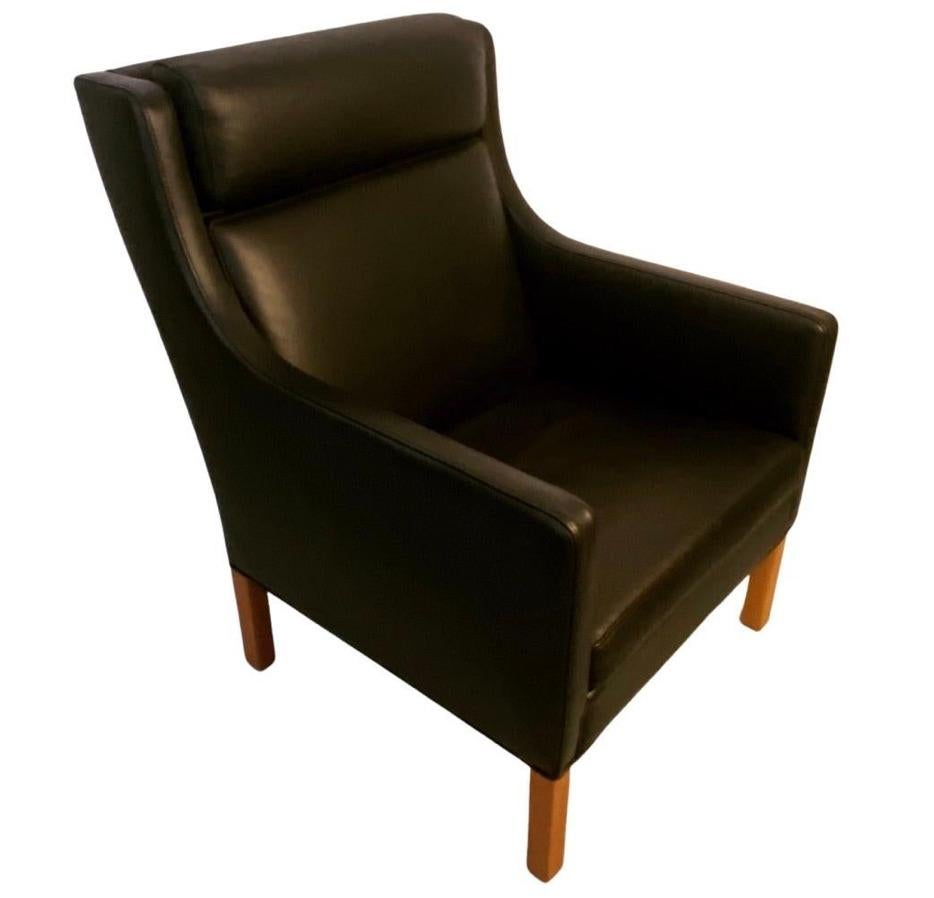 This is a very rare armchair by Danish architect Børge Mogensen. 

He designed it 1975 together with his brother, Peter Mogensen, and only a limited amount was produced at legendary Fredericia Stolefabrik.

Legs in solid oak. Black leather.

We have